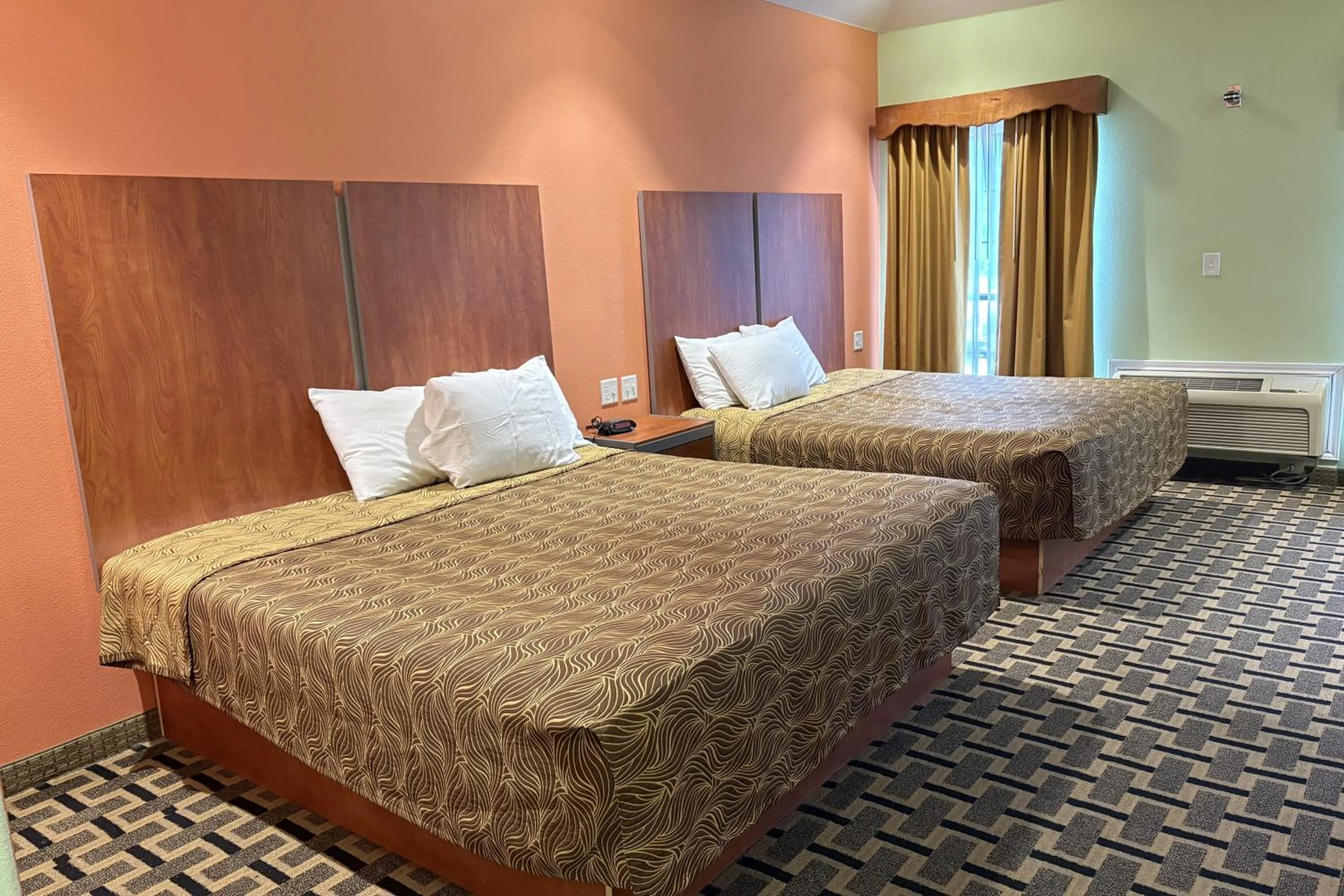 Bedroom, Bed in Regency Inn & Suites By Capital O Houston IAH Airport