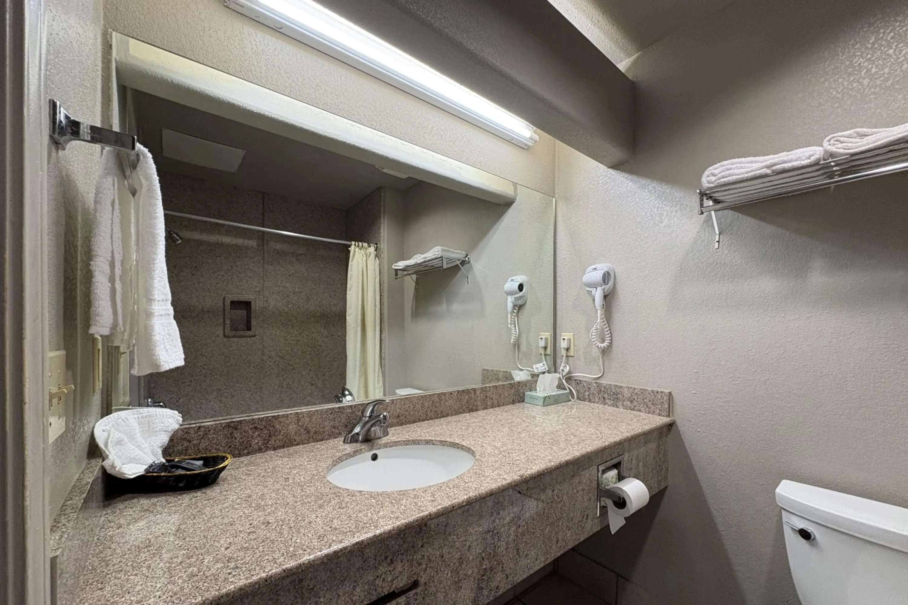 Bathroom in Regency Inn & Suites By Capital O Houston IAH Airport