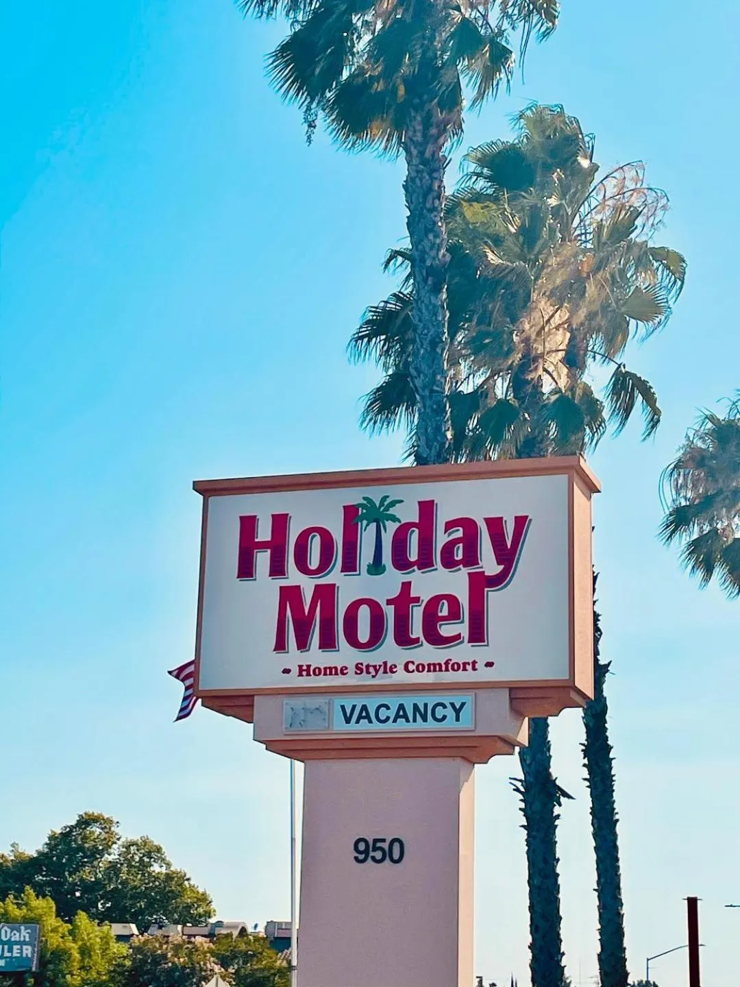 Property logo or sign in Holiday Motel Oakdale