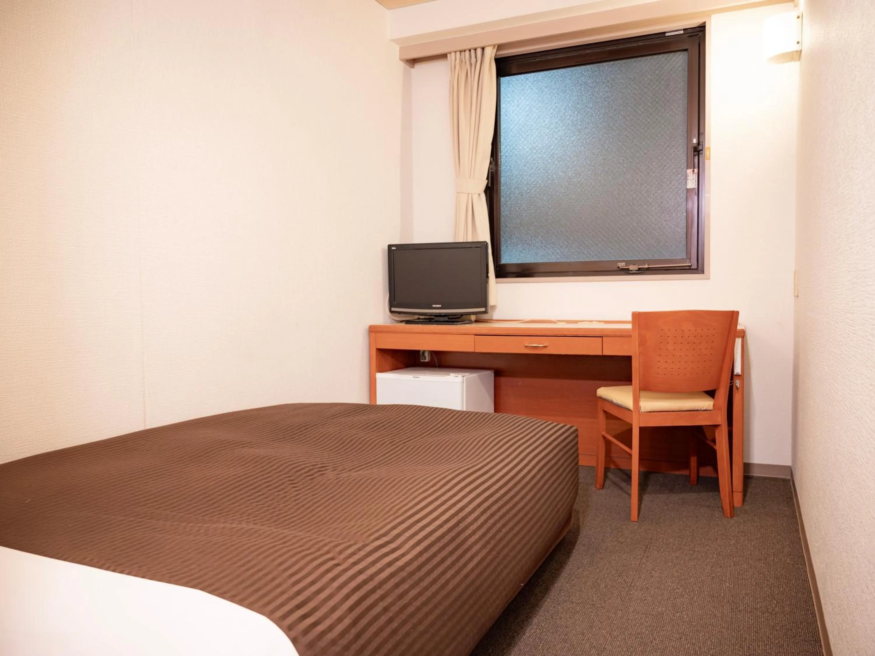 Photo of the whole room, Bed in Numazu Grand Hotel