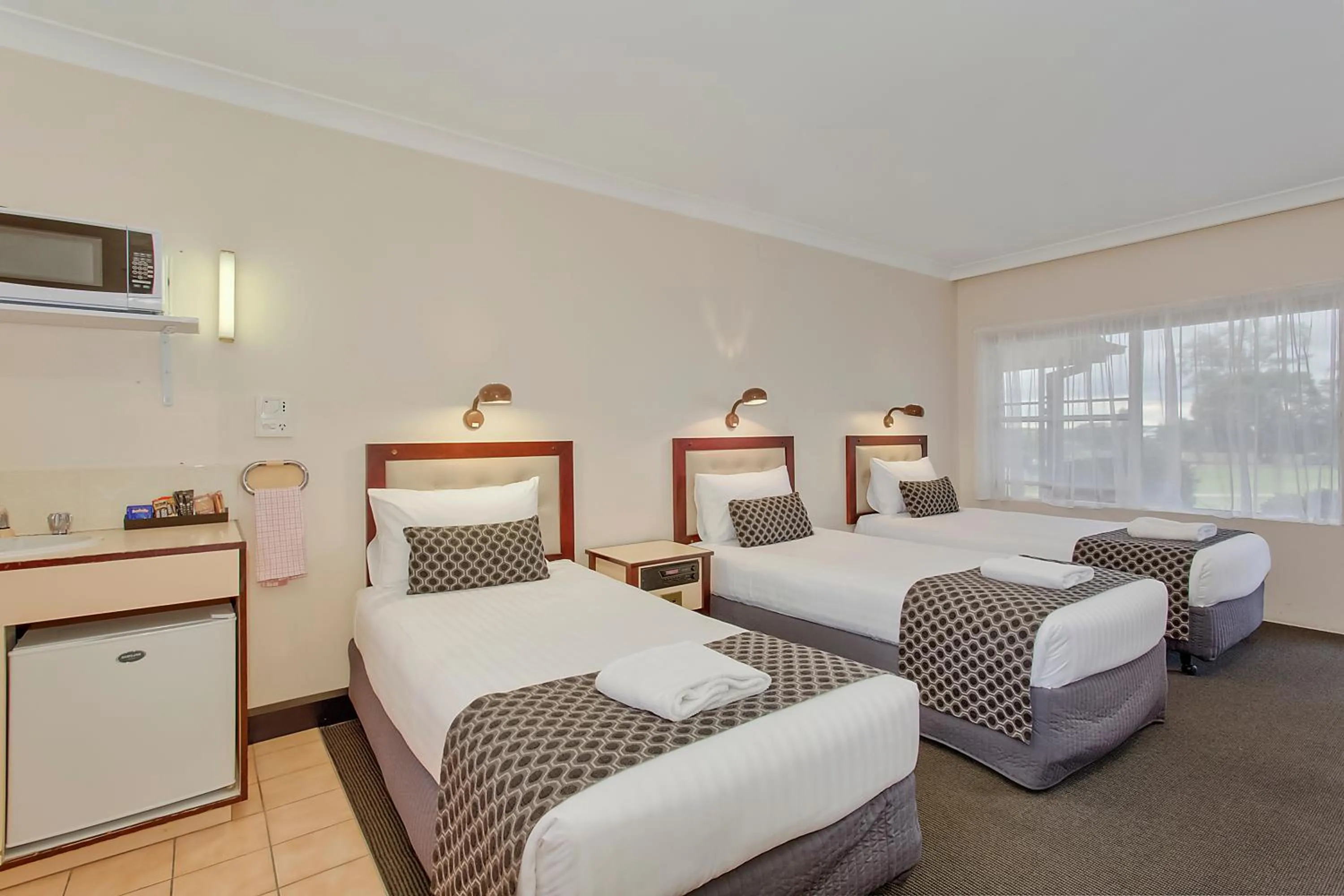 Bedroom, Bed in Econo Lodge Savannah Park Tamworth