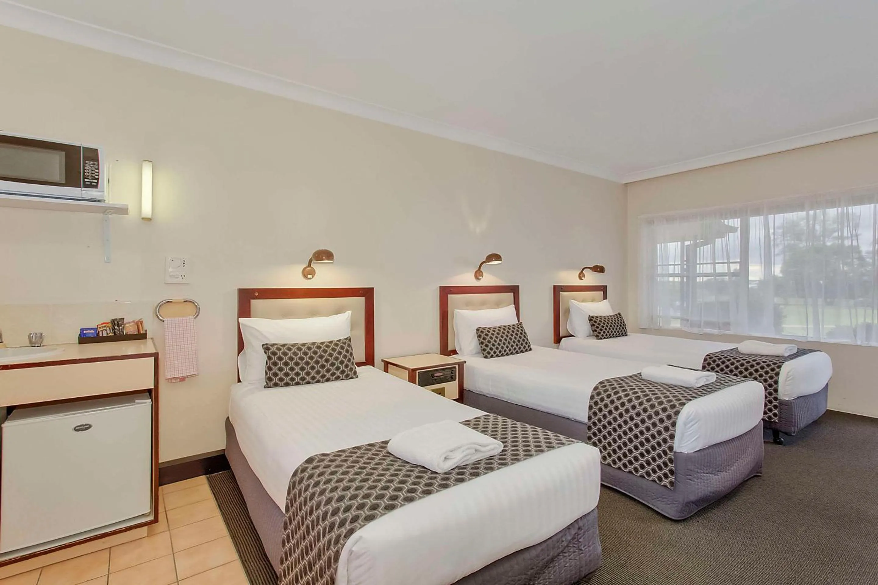 Bedroom, Bed in Econo Lodge Savannah Park Tamworth