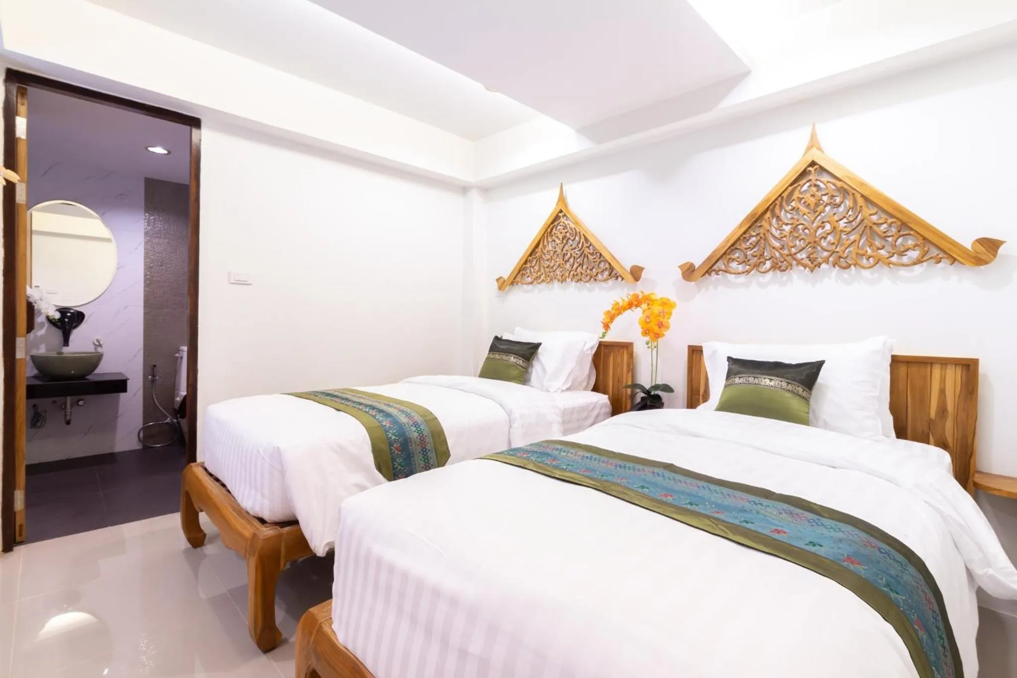 Bed in Anumat Premium Budget Hotel