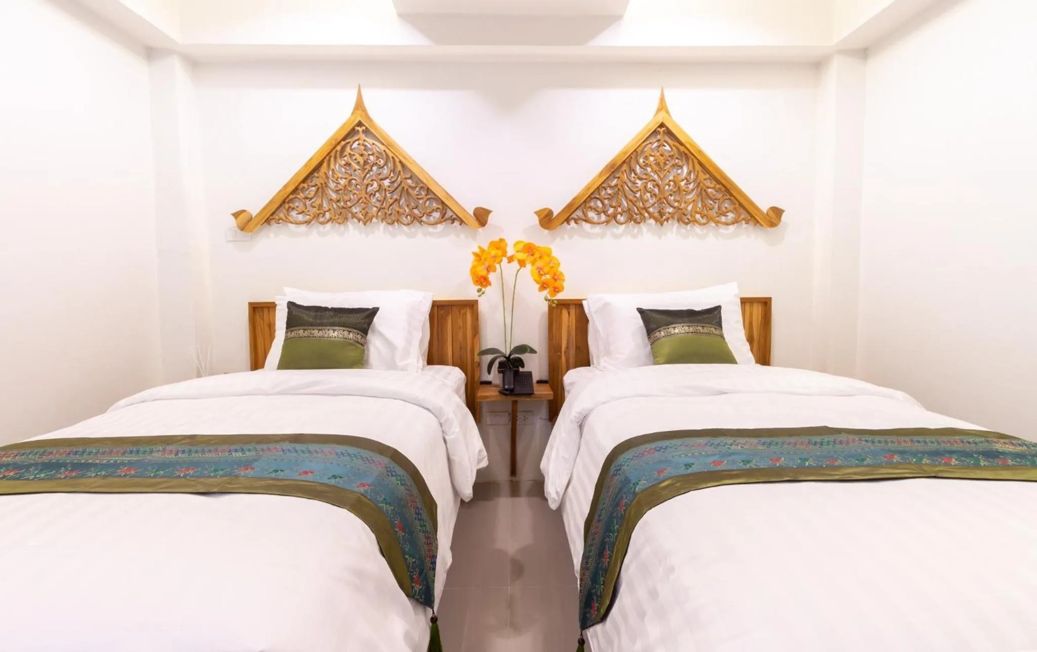 Bed in Anumat Premium Budget Hotel