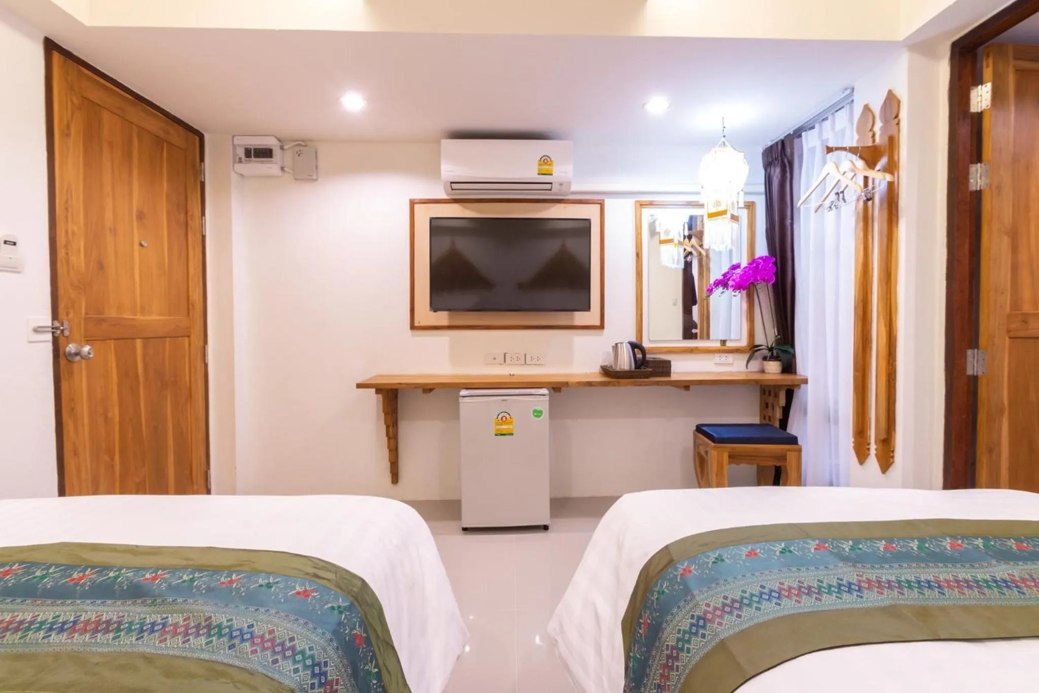 Bed in Anumat Premium Budget Hotel