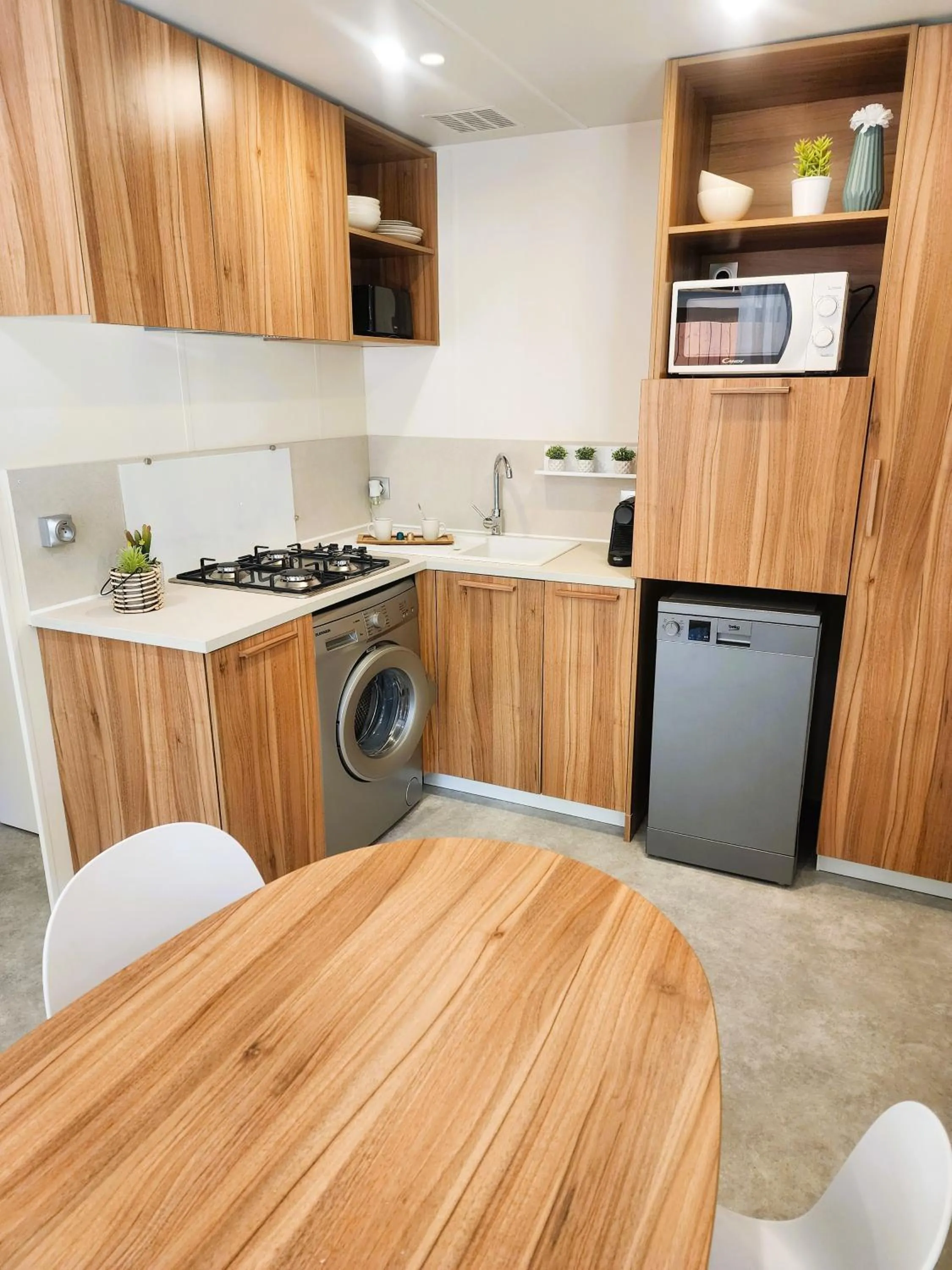 Kitchen or kitchenette in Mobil Homes Vacances