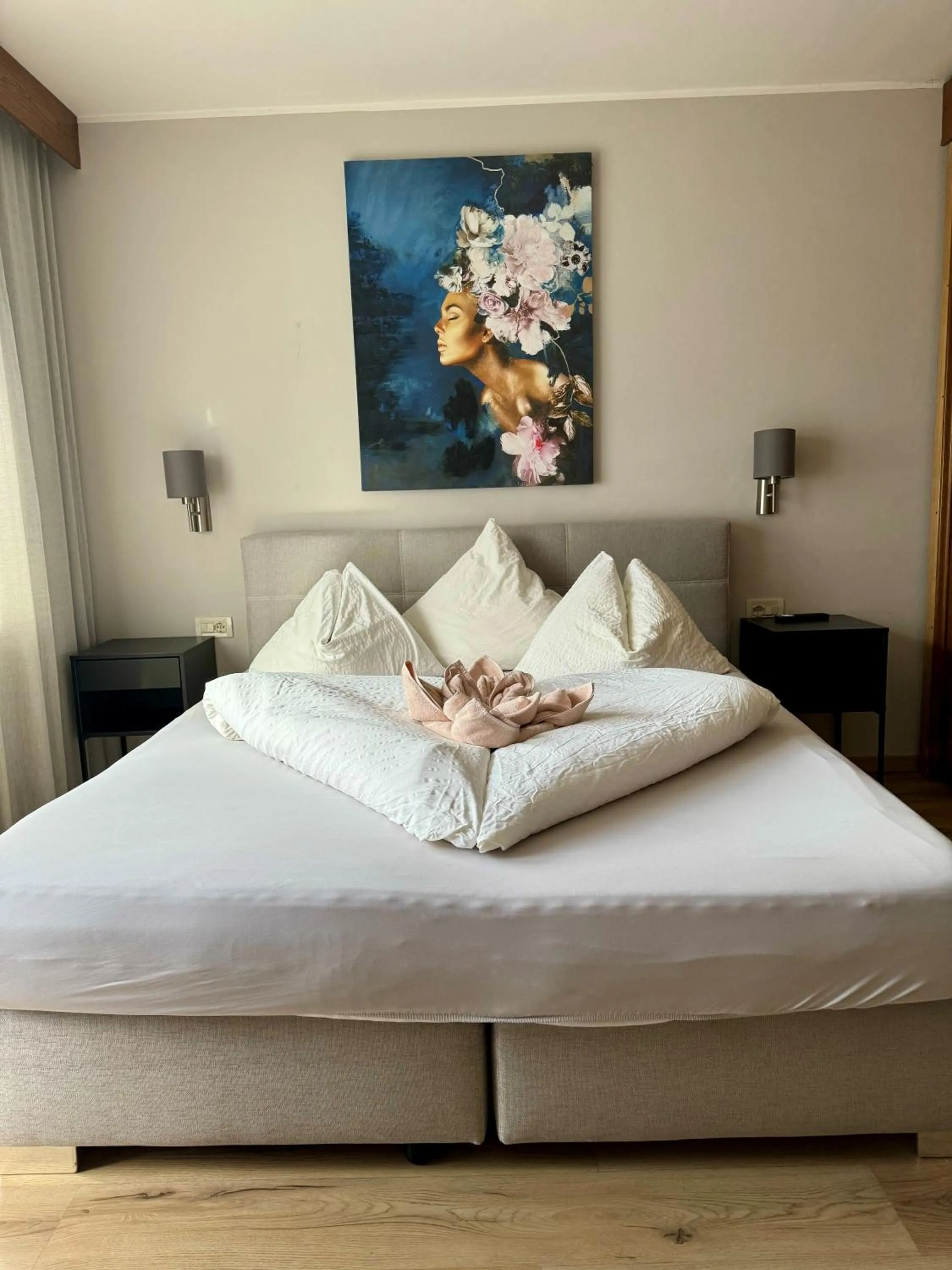 Bed in Hotel Residence MaVie