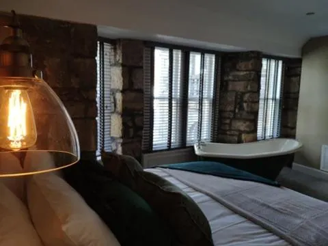 Bed in The Covenanter Hotel