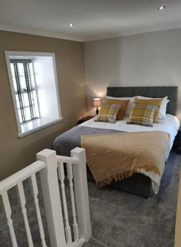 Bed in The Covenanter Hotel