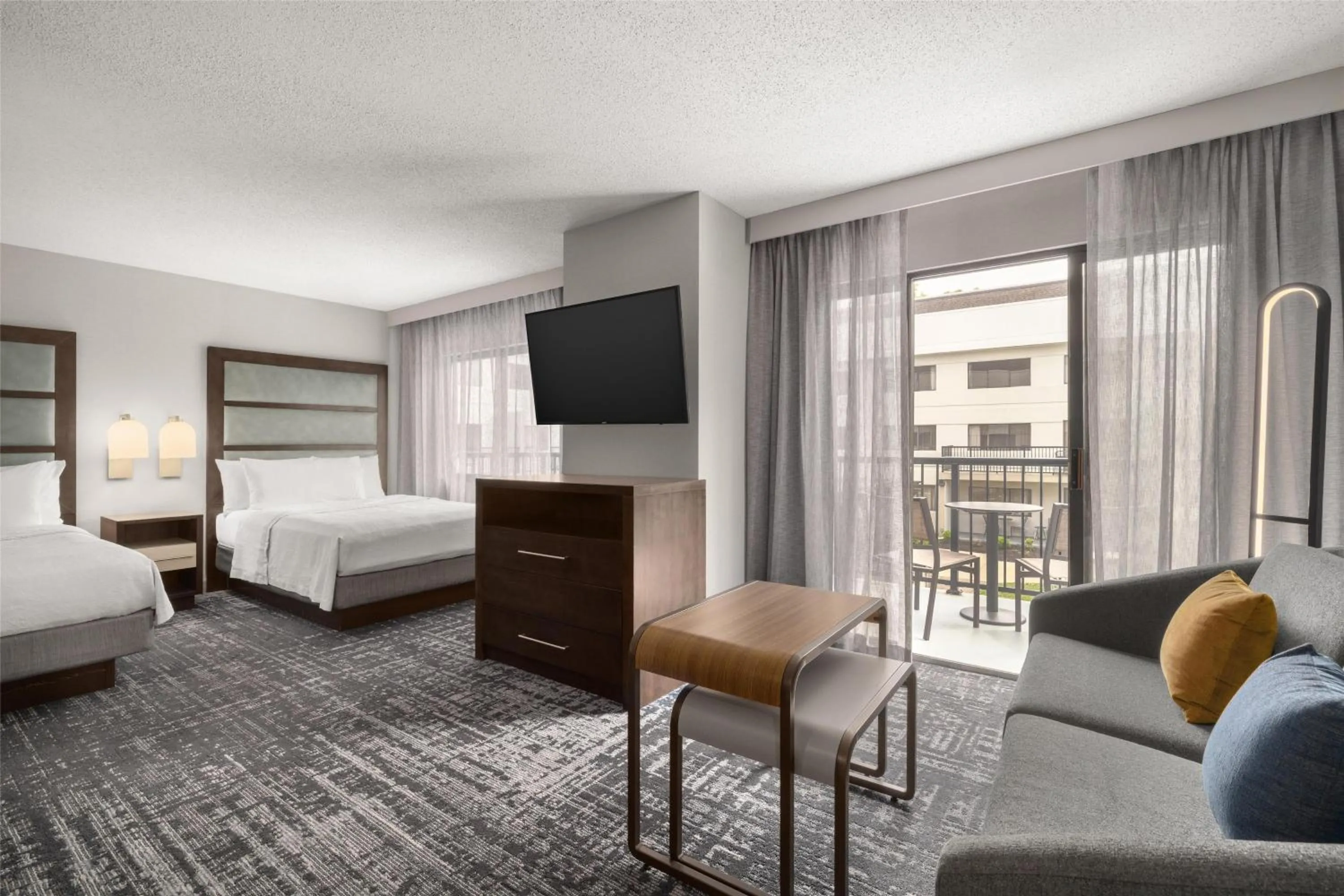 Living room, Bed in Homewood Suites by Hilton Indianapolis Carmel