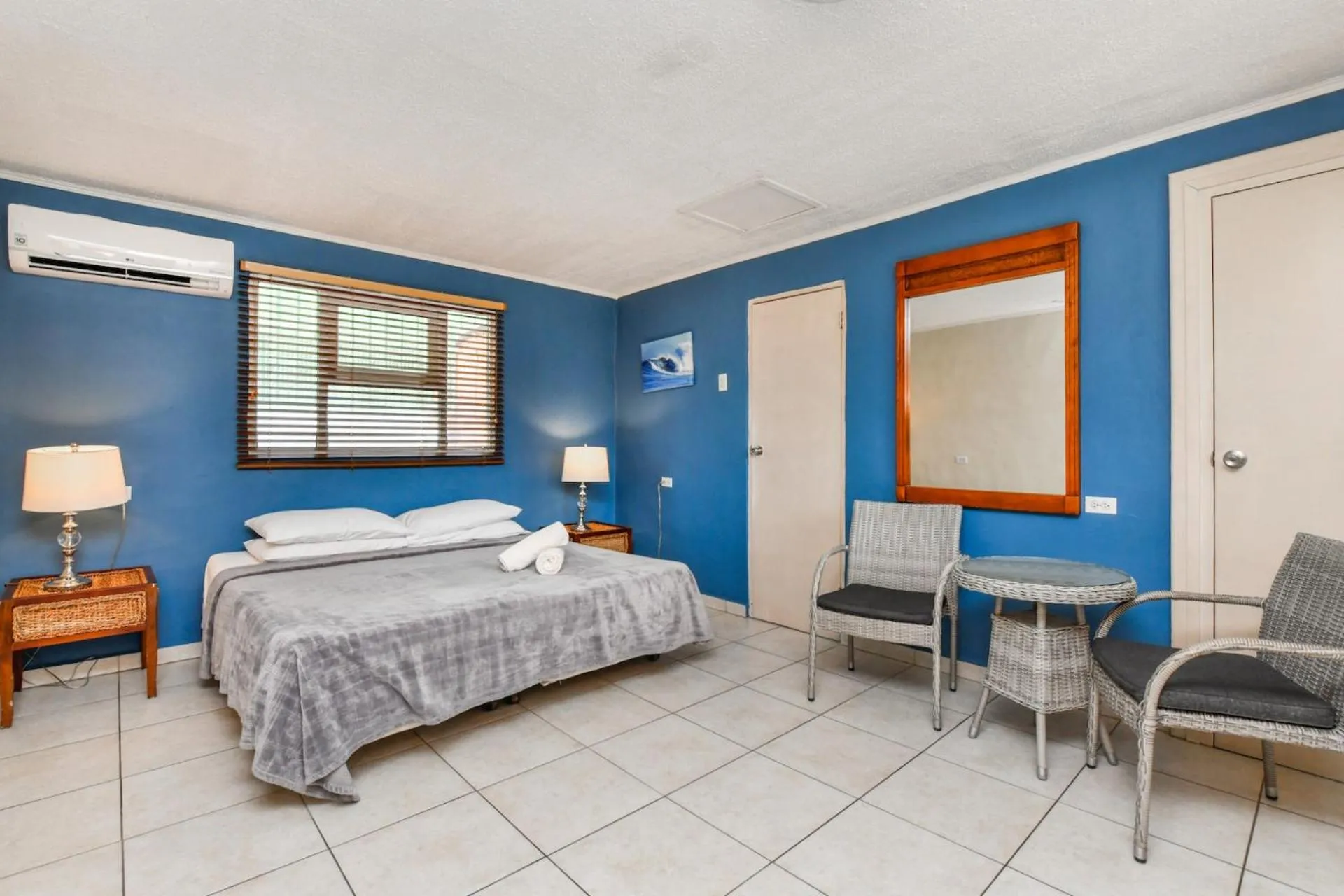 Bed in Arubiana Inn Hotel