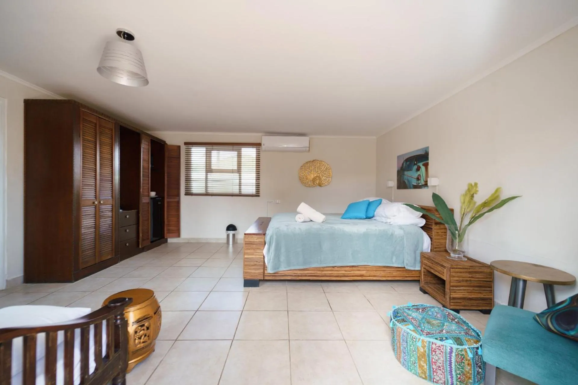 Bed in Arubiana Inn Hotel