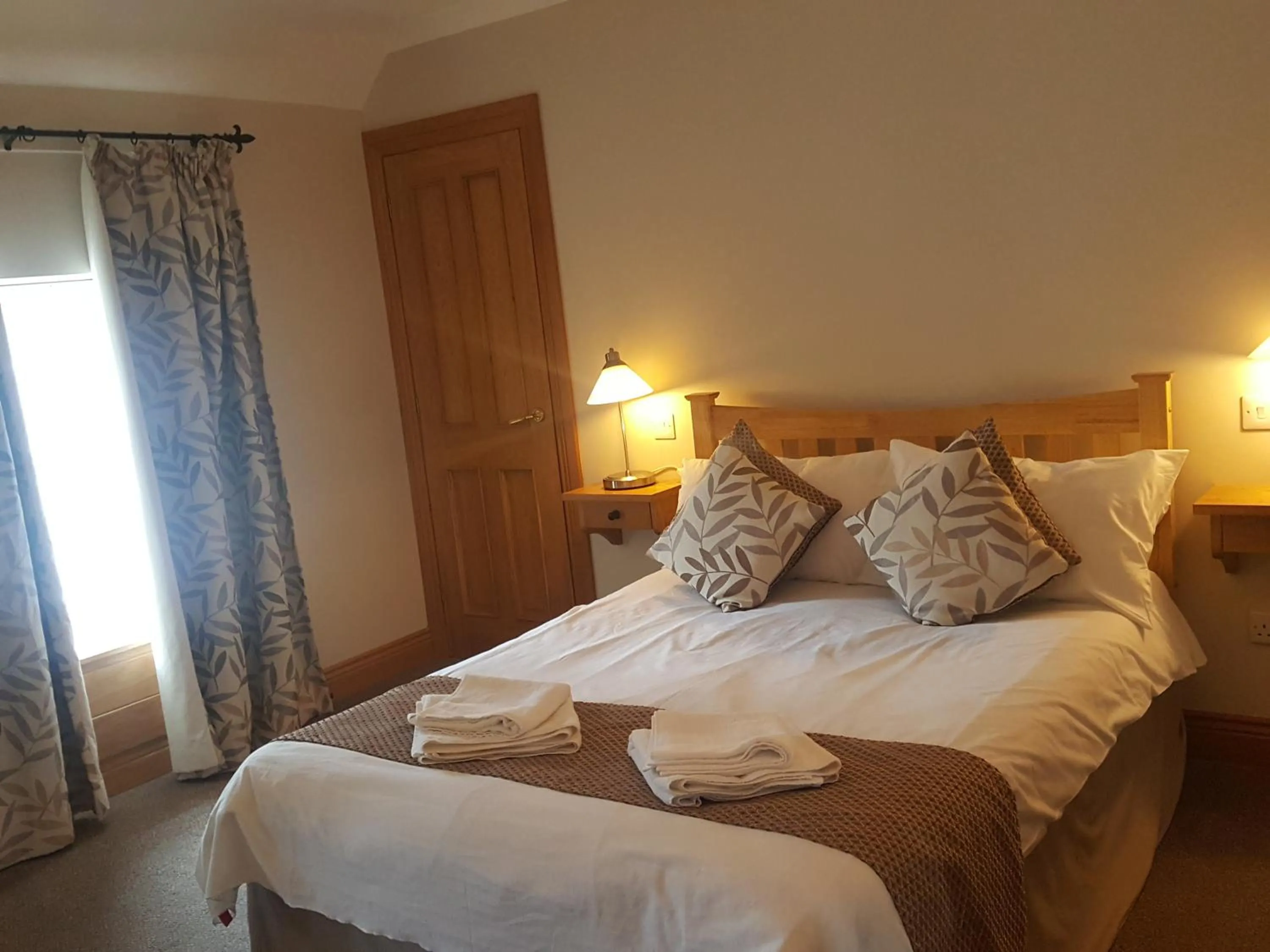 Bed in The Spread Eagle Hotel