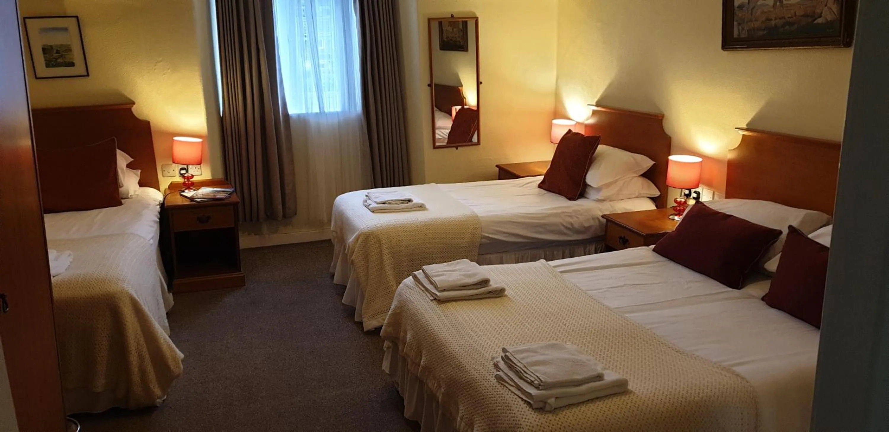 Bed in The Spread Eagle Hotel