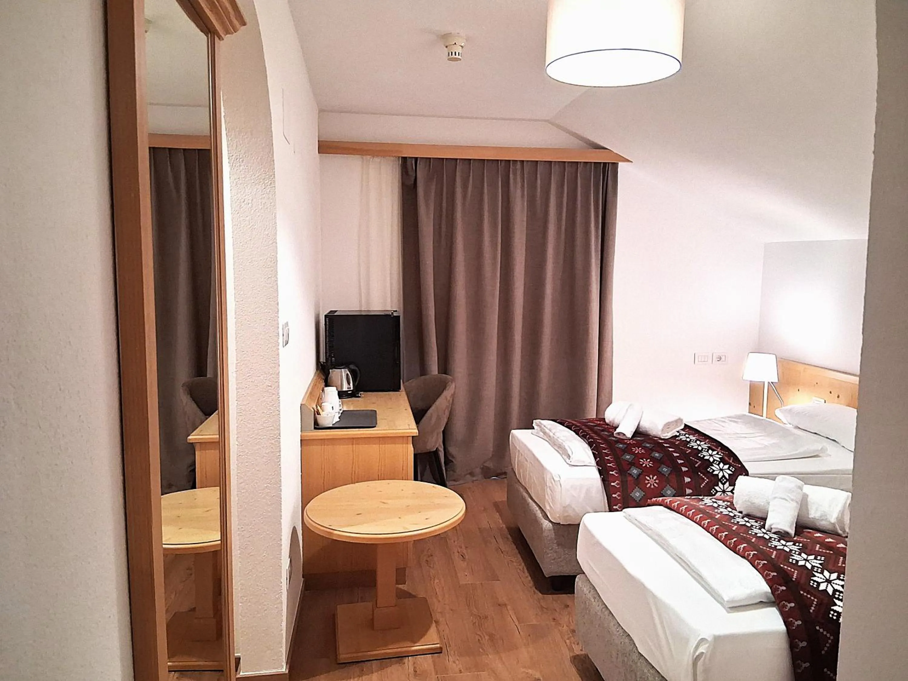 Bed in Hotel Kronplatzer Hof