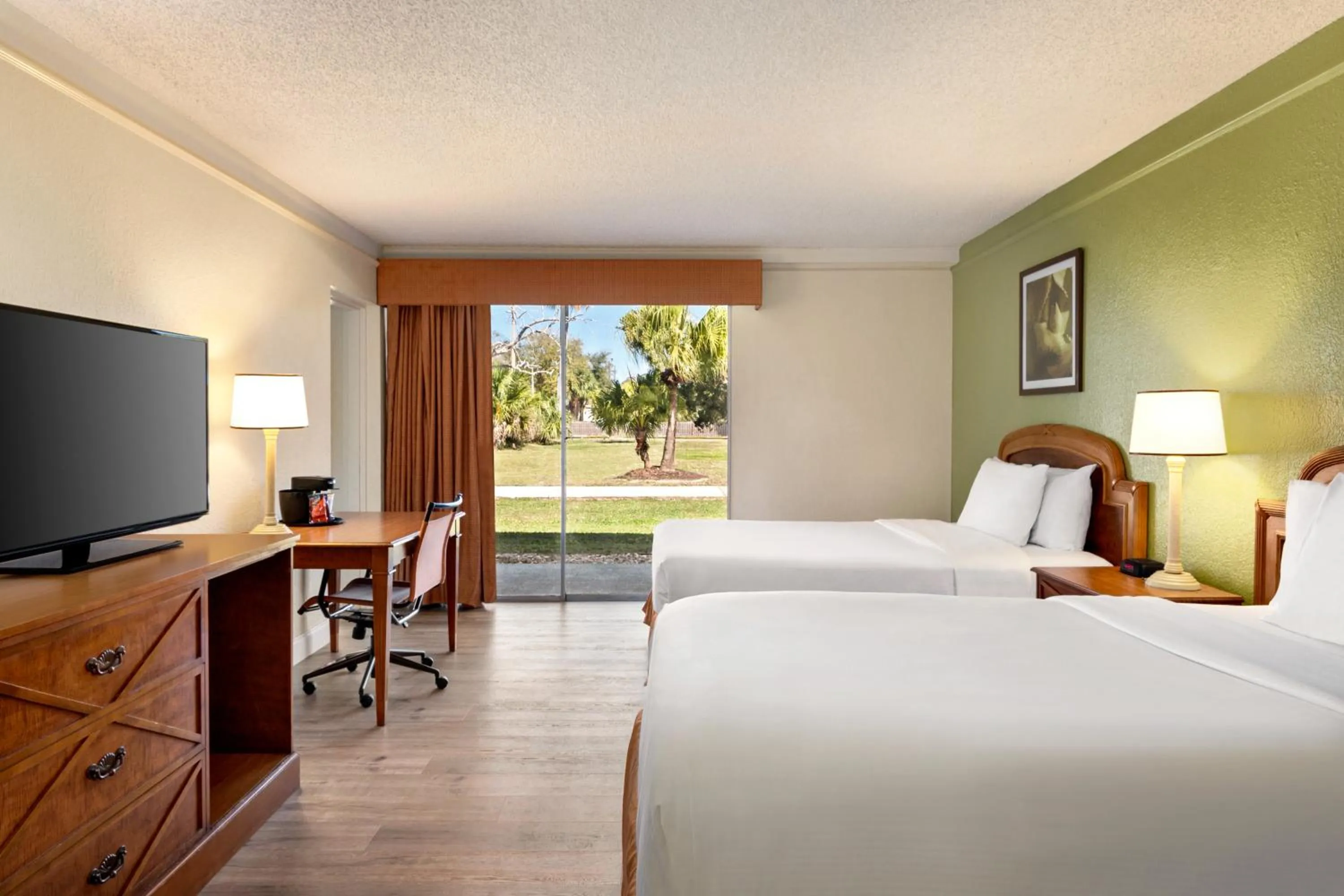 Photo of the whole room, Bed in Baymont by Wyndham Intl Speedway I-95 Daytona Beach