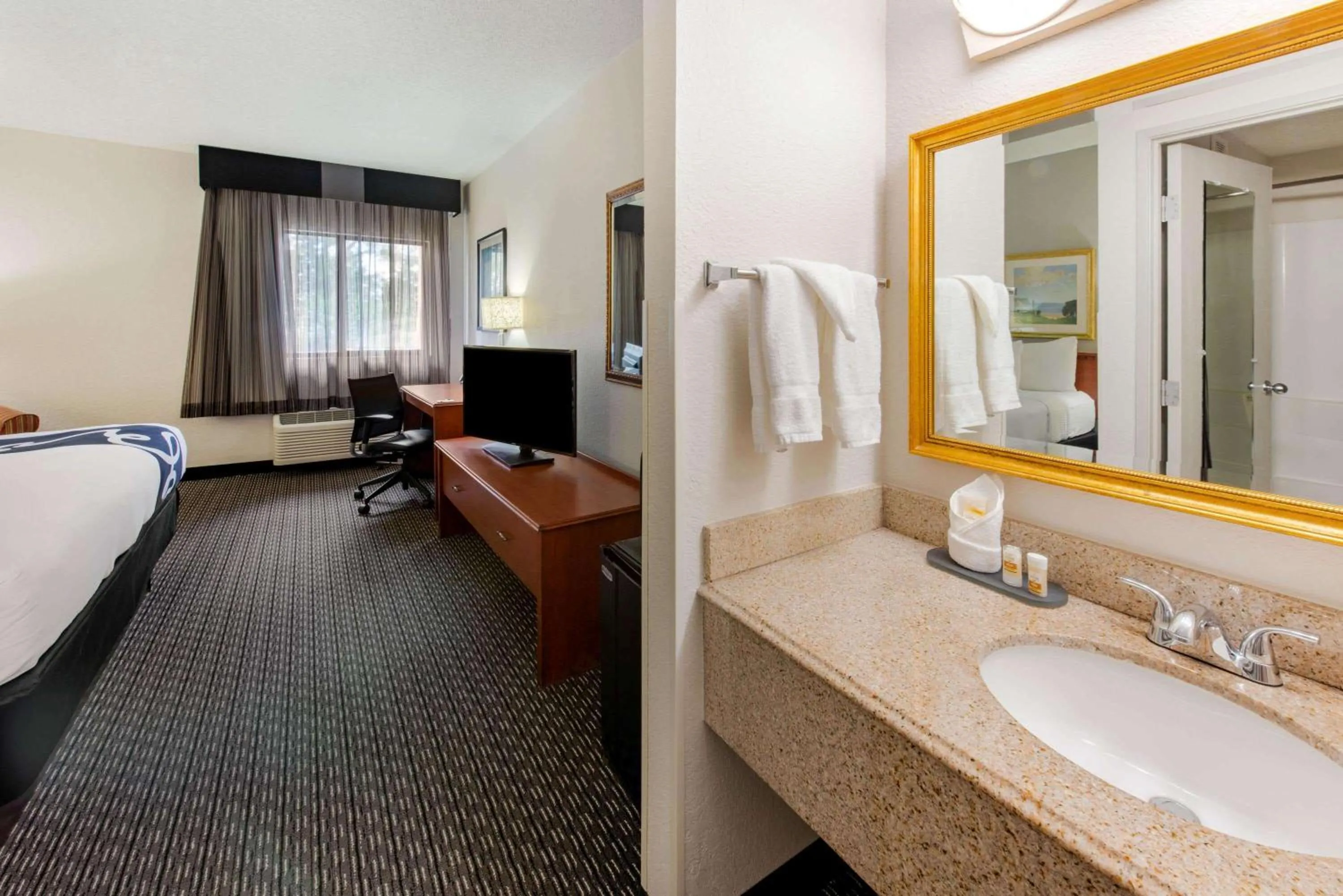 Bathroom, Bed in La Quinta Inn by Wyndham Ft. Lauderdale Tamarac East