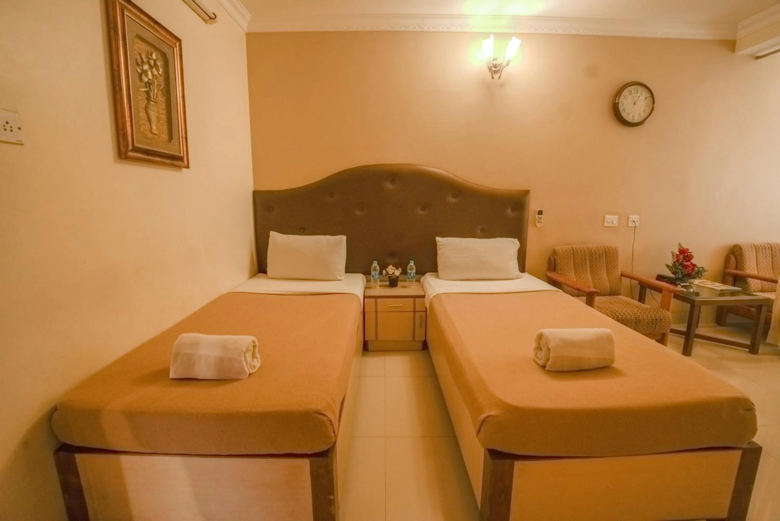 Bed in HOTEL UDUPI INTERNATIONAL