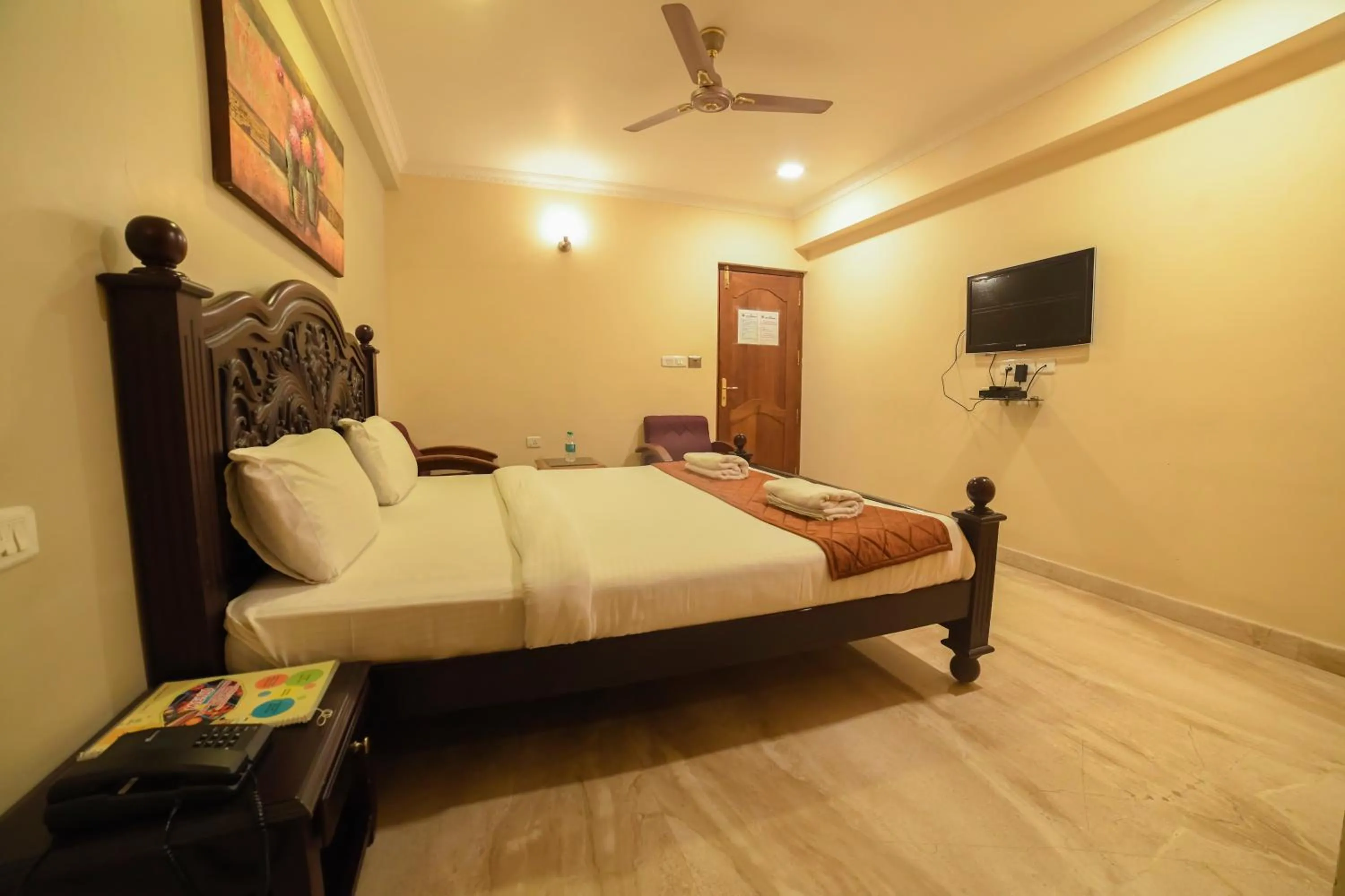 Bed in HOTEL UDUPI INTERNATIONAL