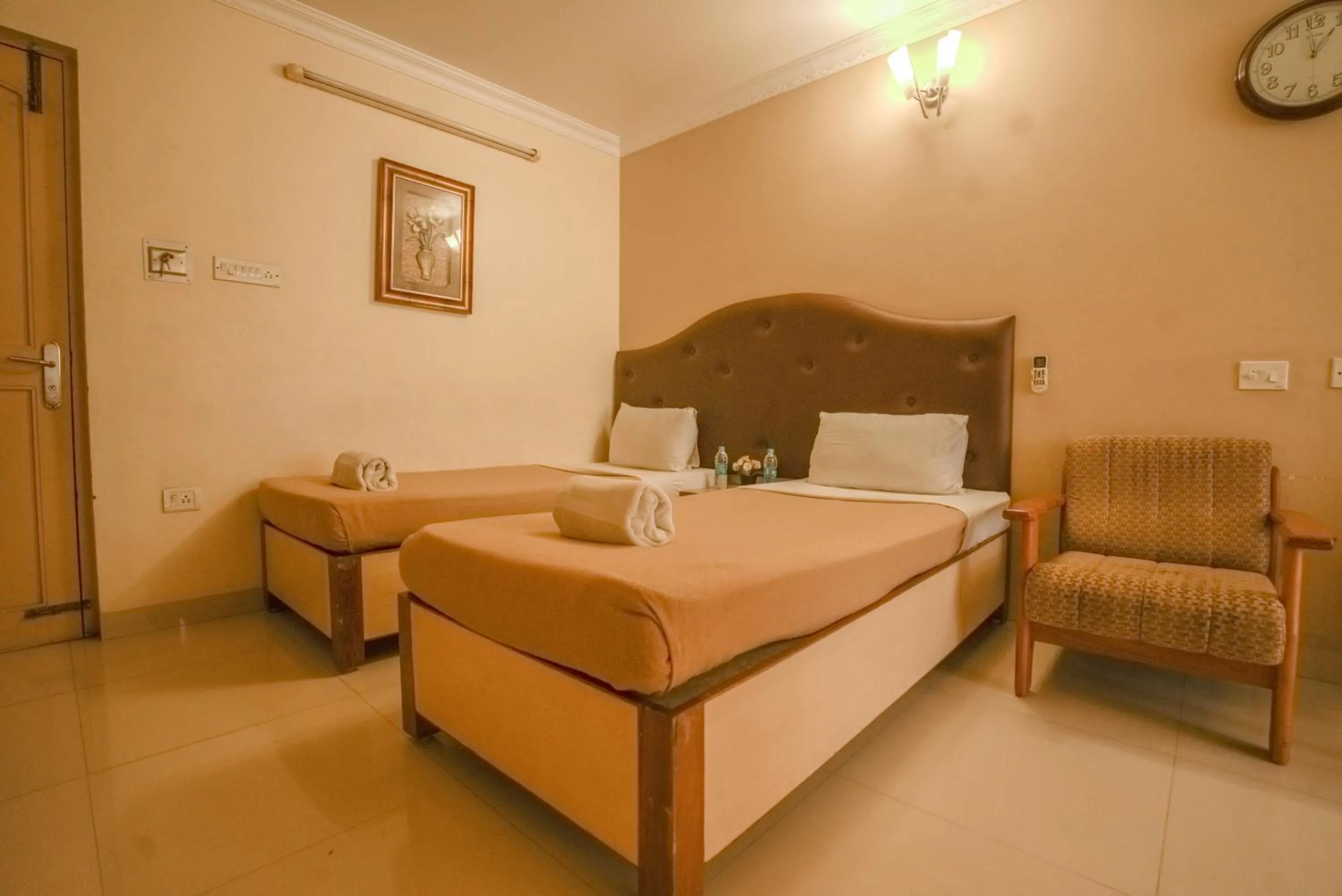 Bed in HOTEL UDUPI INTERNATIONAL