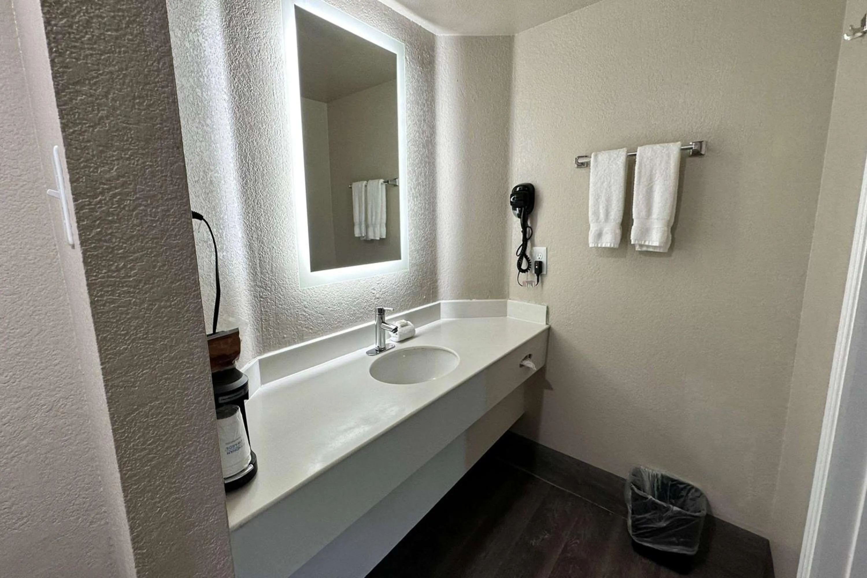 Bathroom in Days Inn by Wyndham San Diego Vista