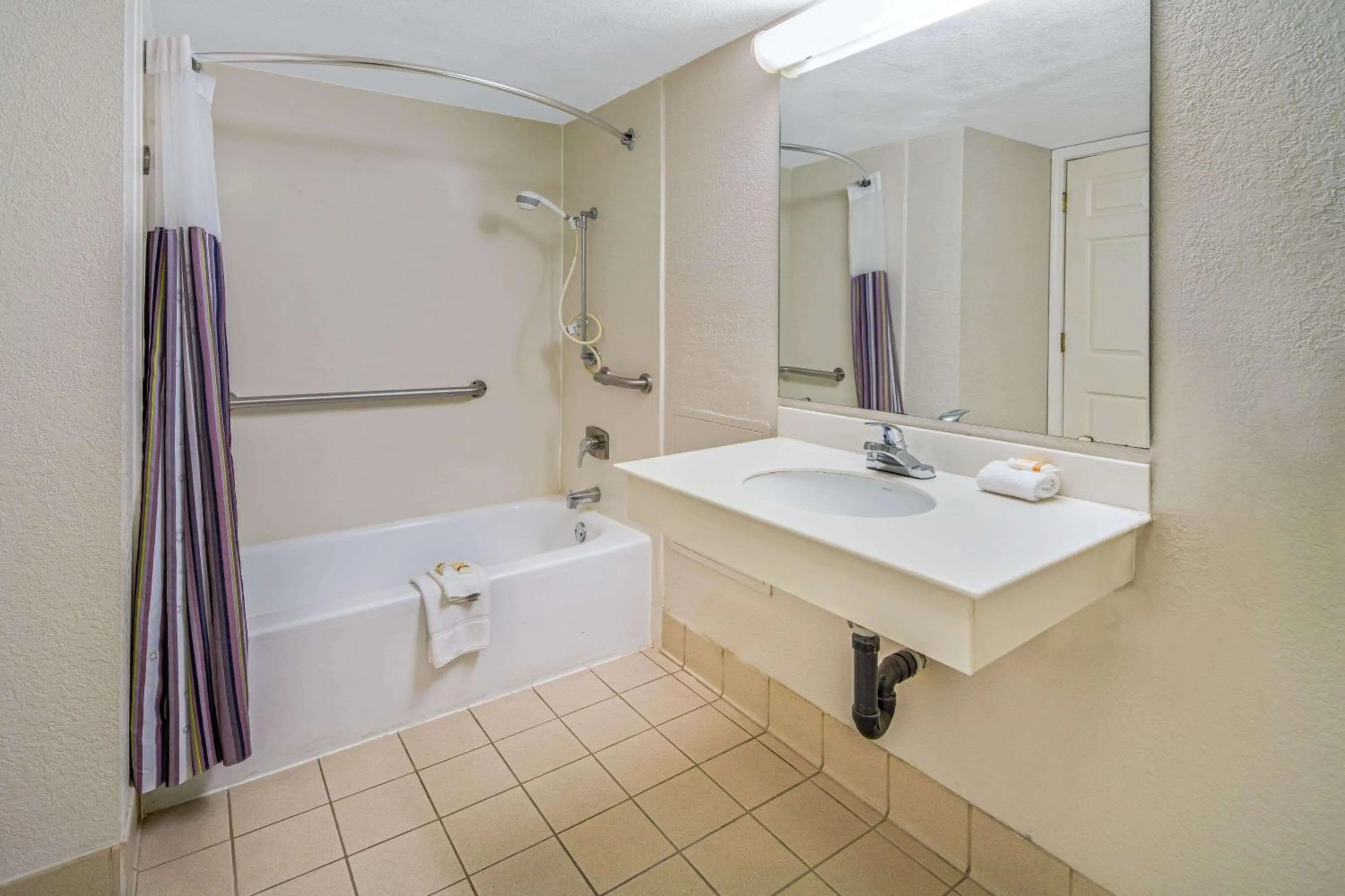Bathroom in Days Inn by Wyndham San Diego Vista