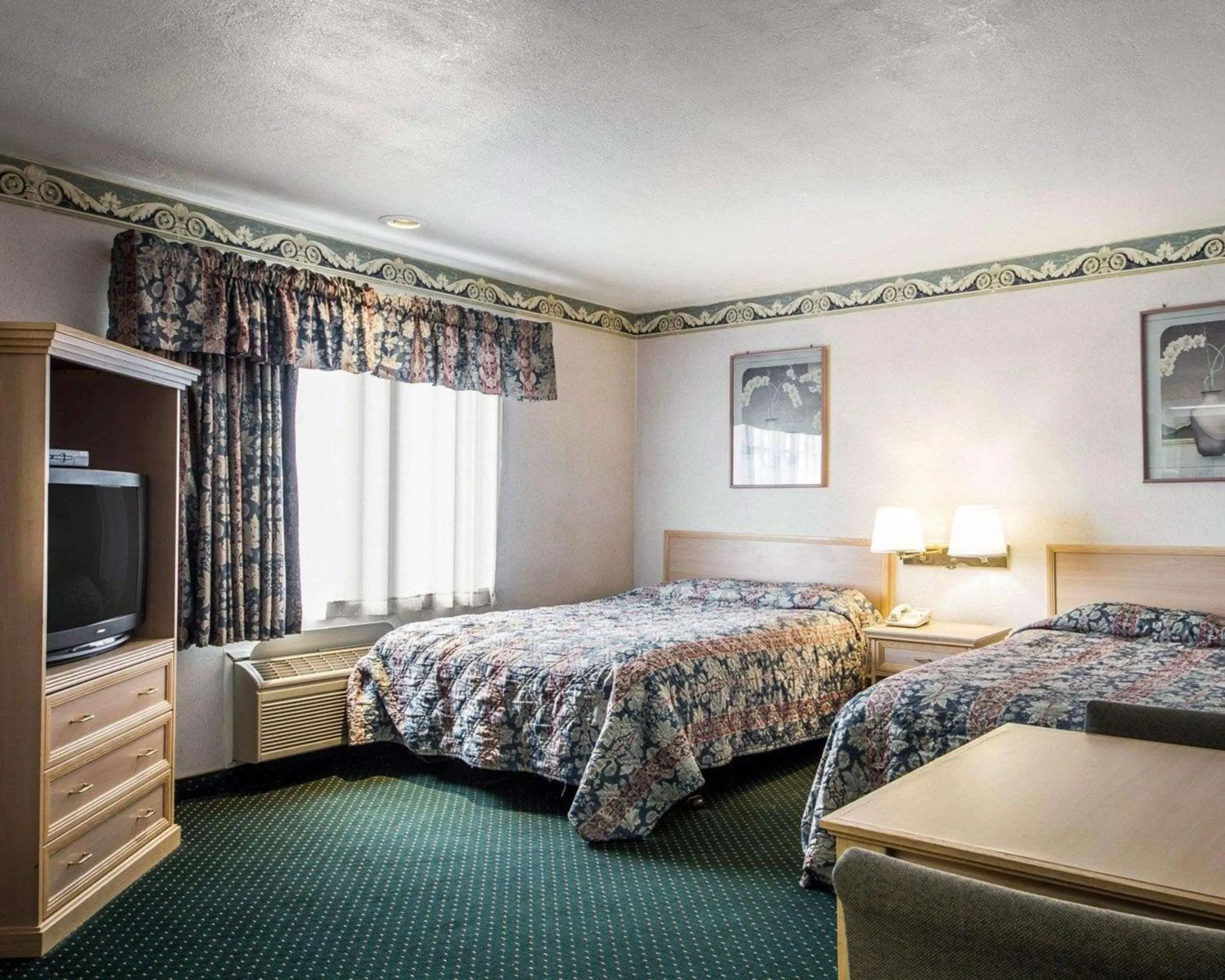 Photo of the whole room, Bed in Rodeway Inn Monterey Near Fairgrounds