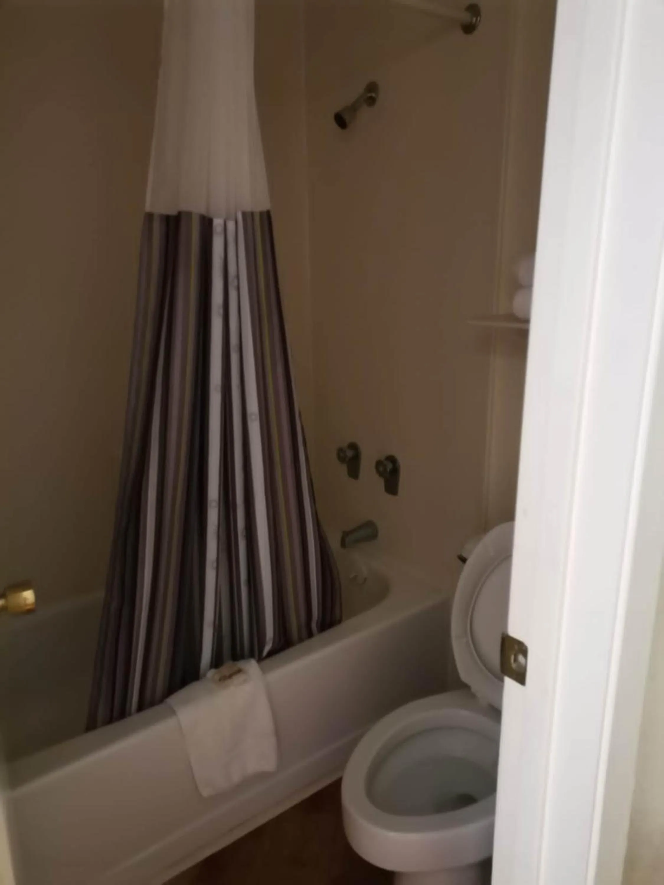 Bathroom in Super 8 by Wyndham San Antonio Near SeaWorld Ingram Park