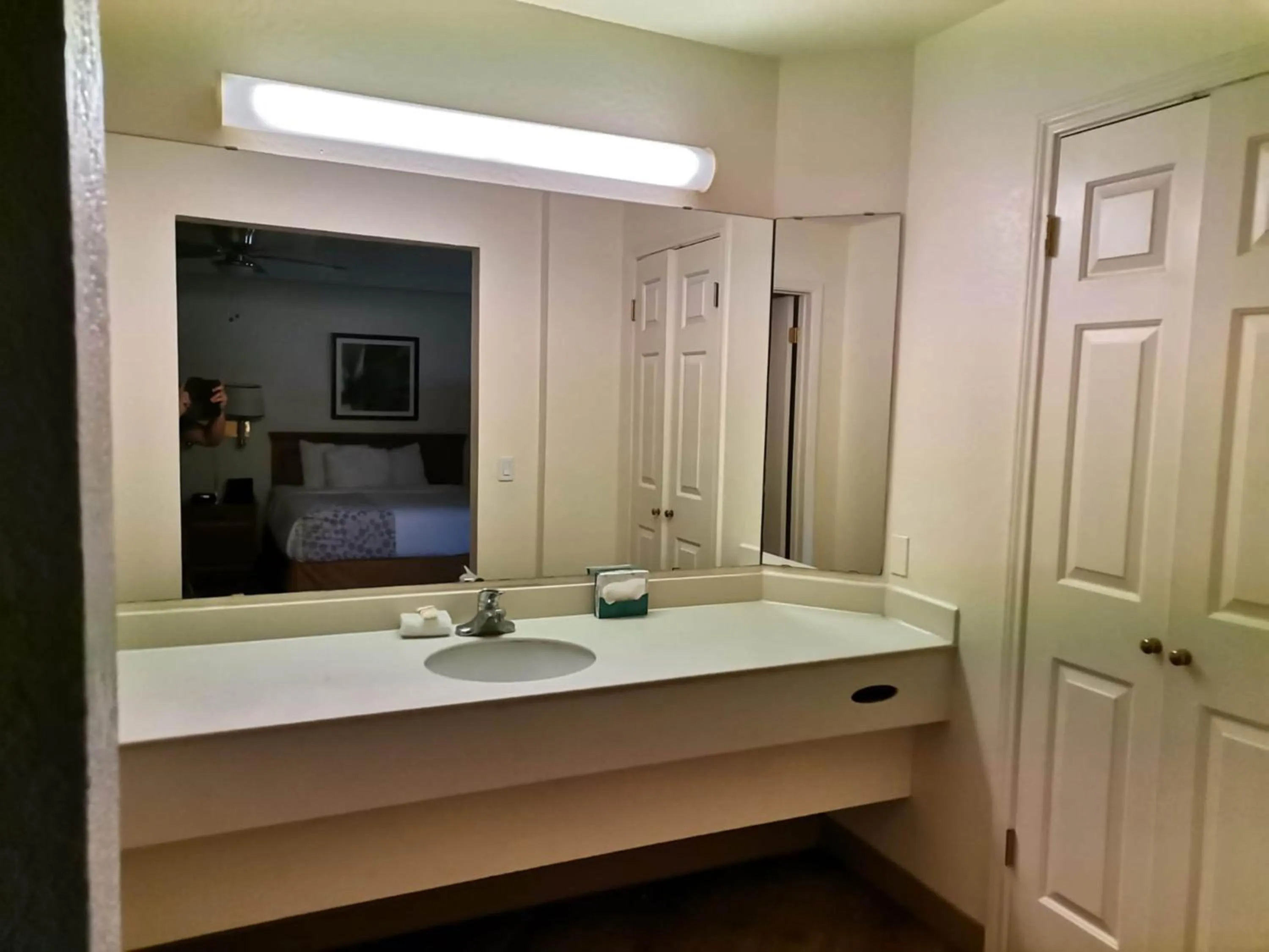 Bathroom in Super 8 by Wyndham San Antonio Near SeaWorld Ingram Park