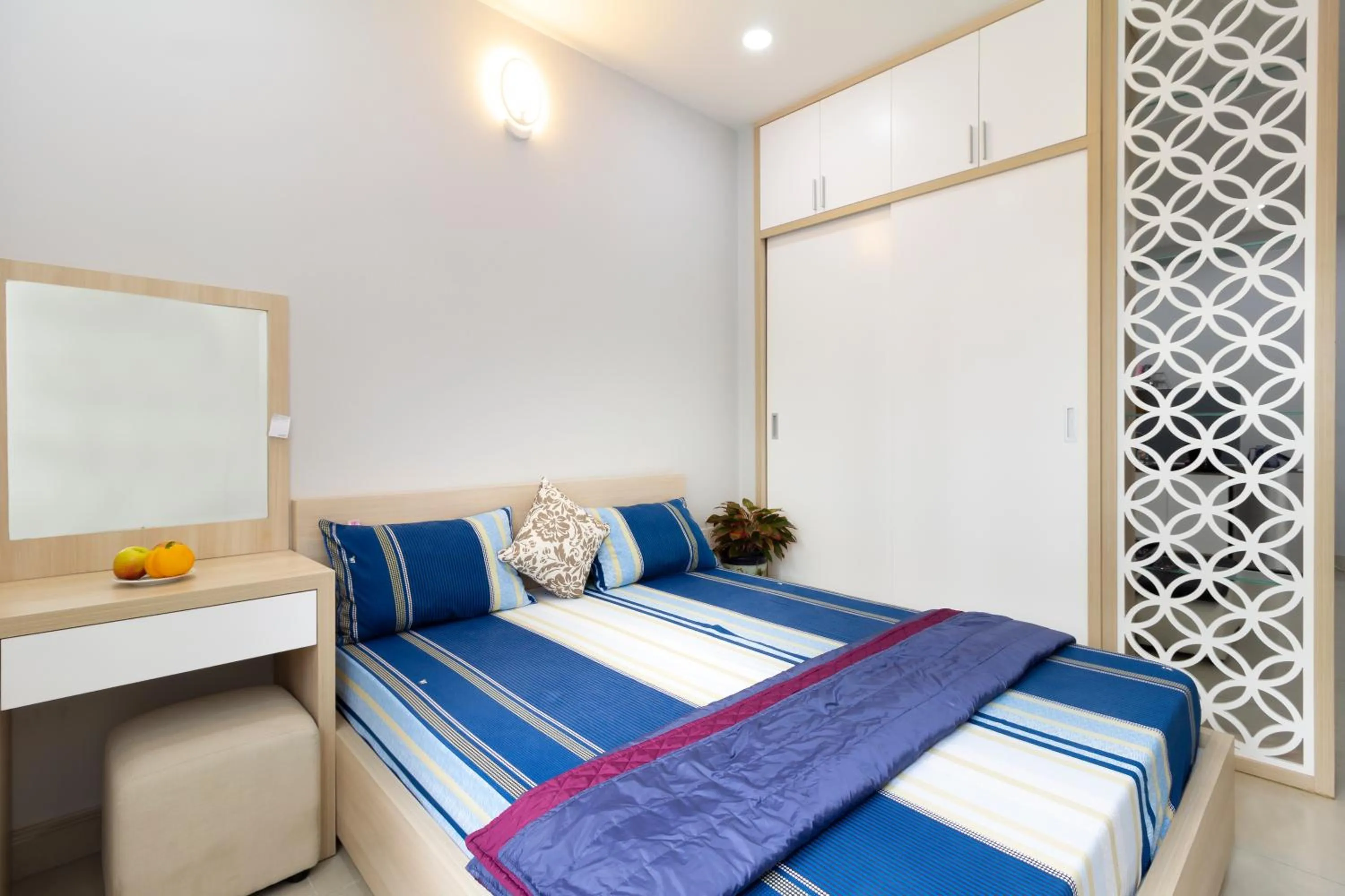 Bed in GEM Apartment