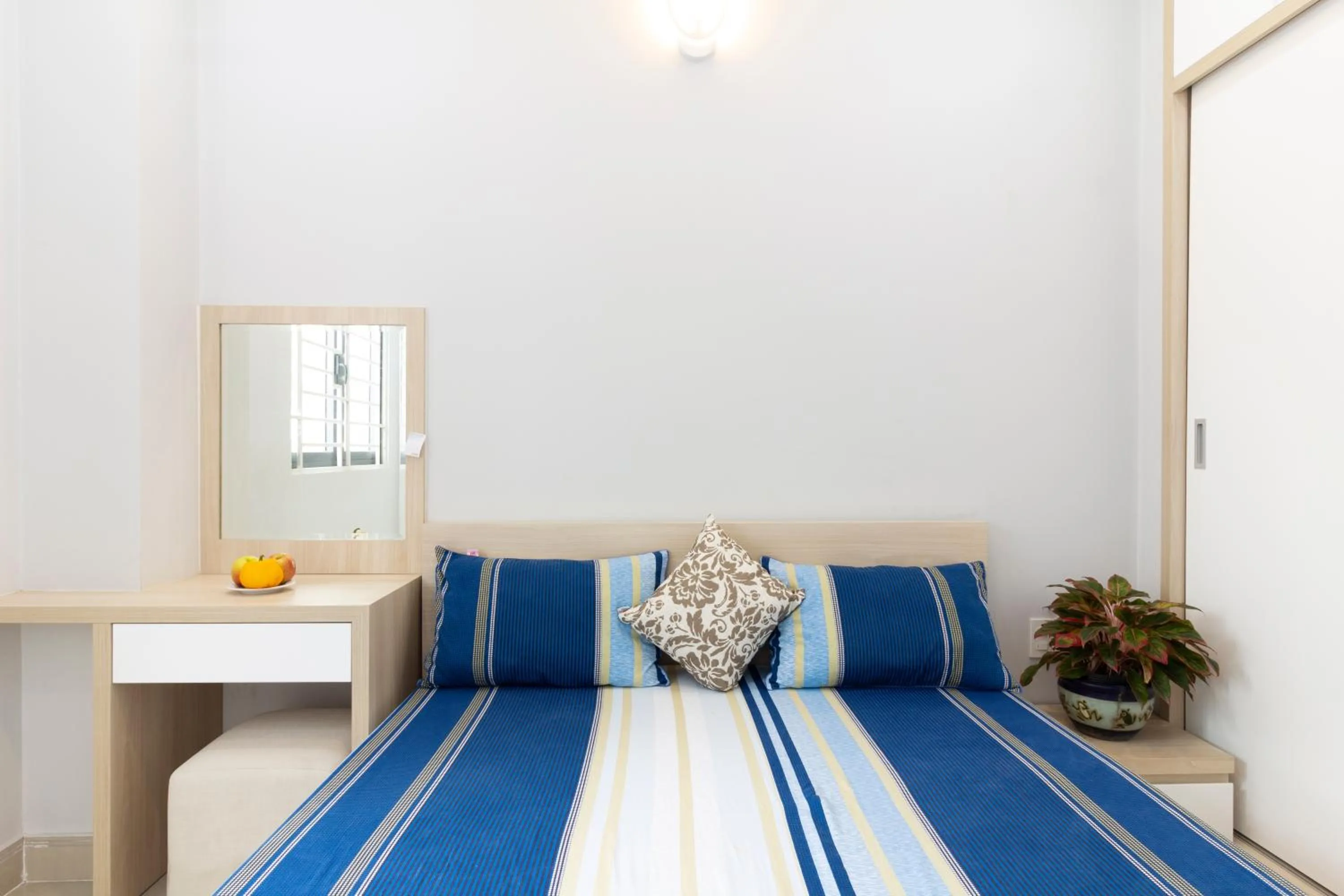 Bed in GEM Apartment