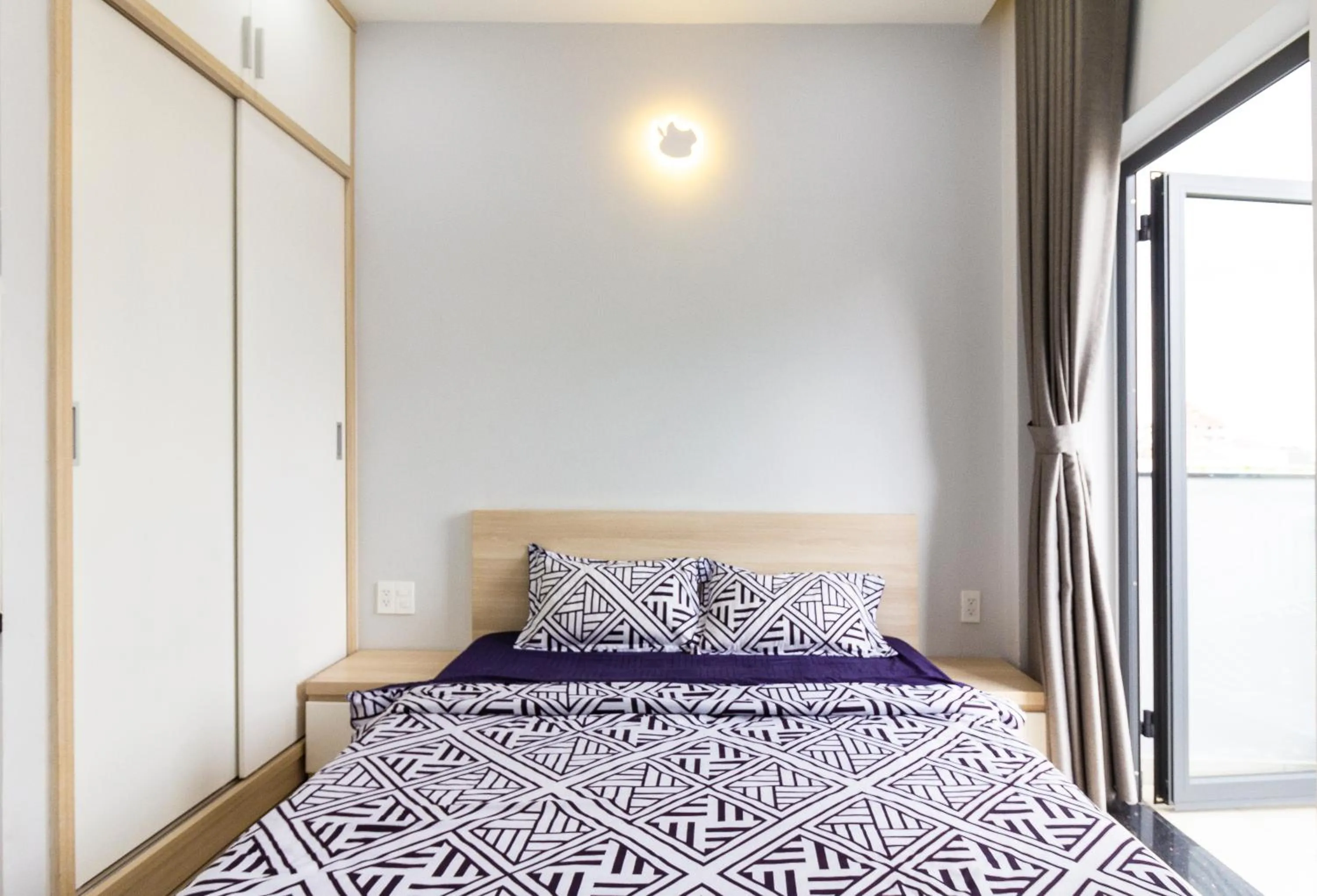 Bed in GEM Apartment