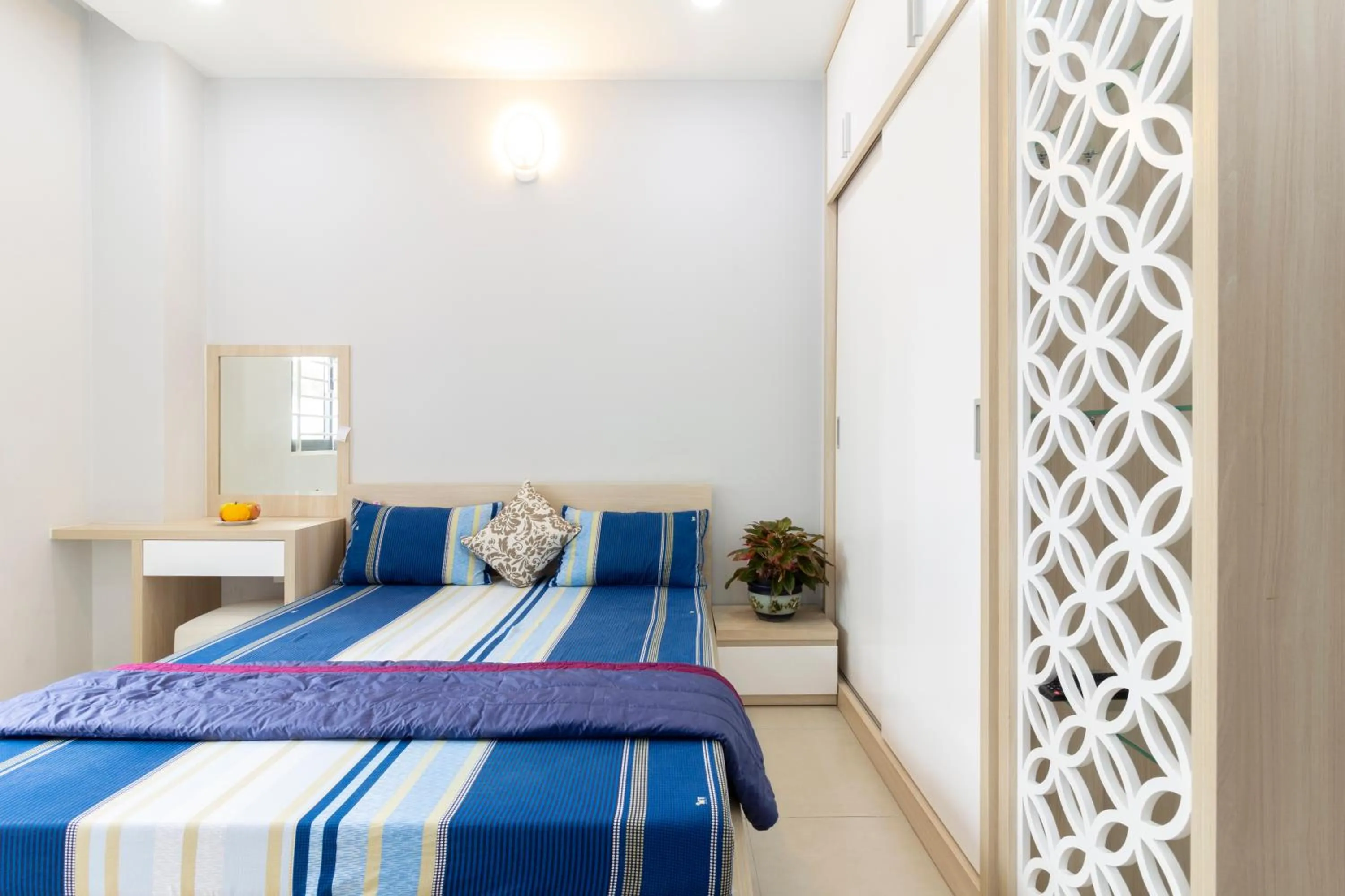 Bed in GEM Apartment