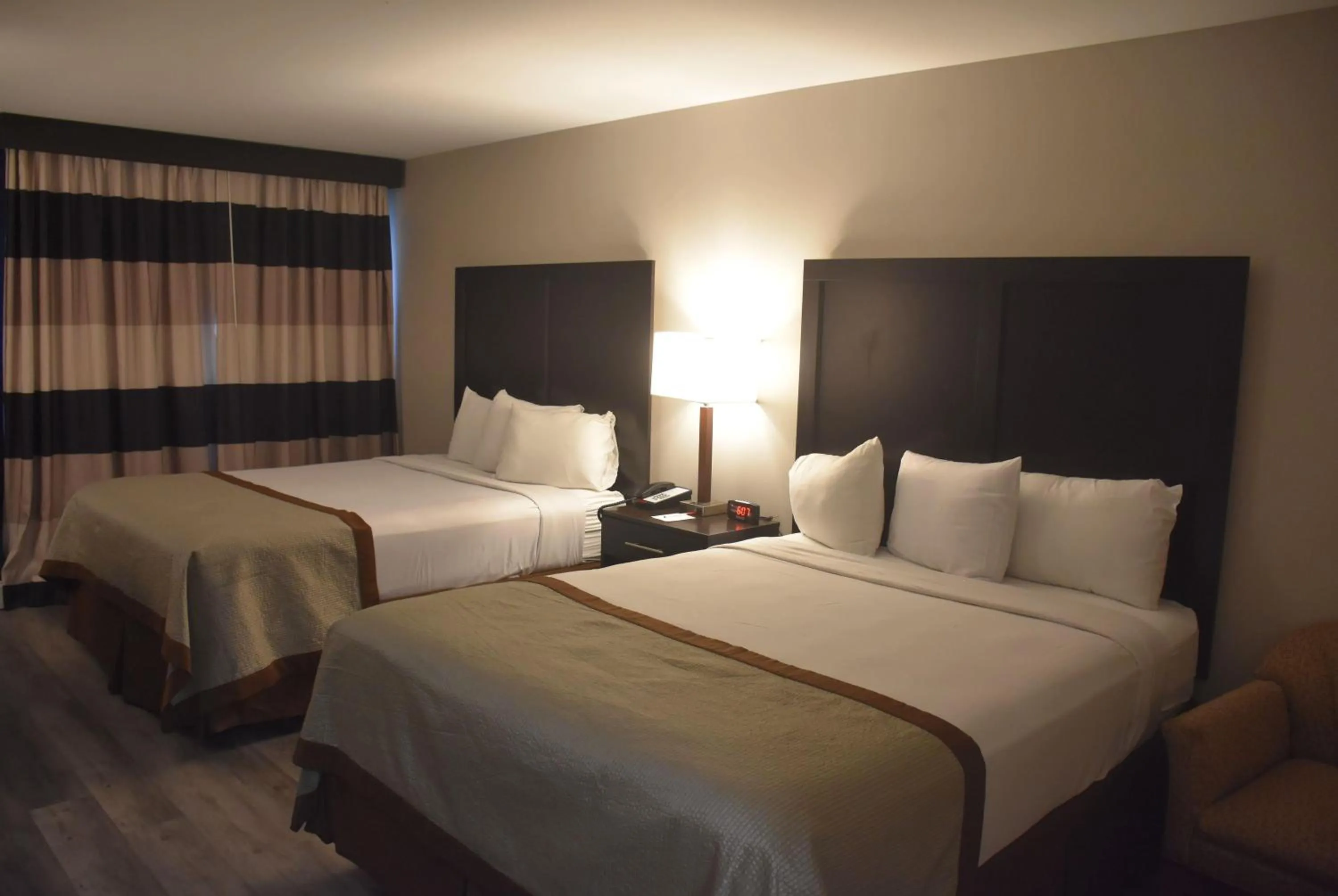 Photo of the whole room, Bed in Ramada by Wyndham Vineland Millville Area