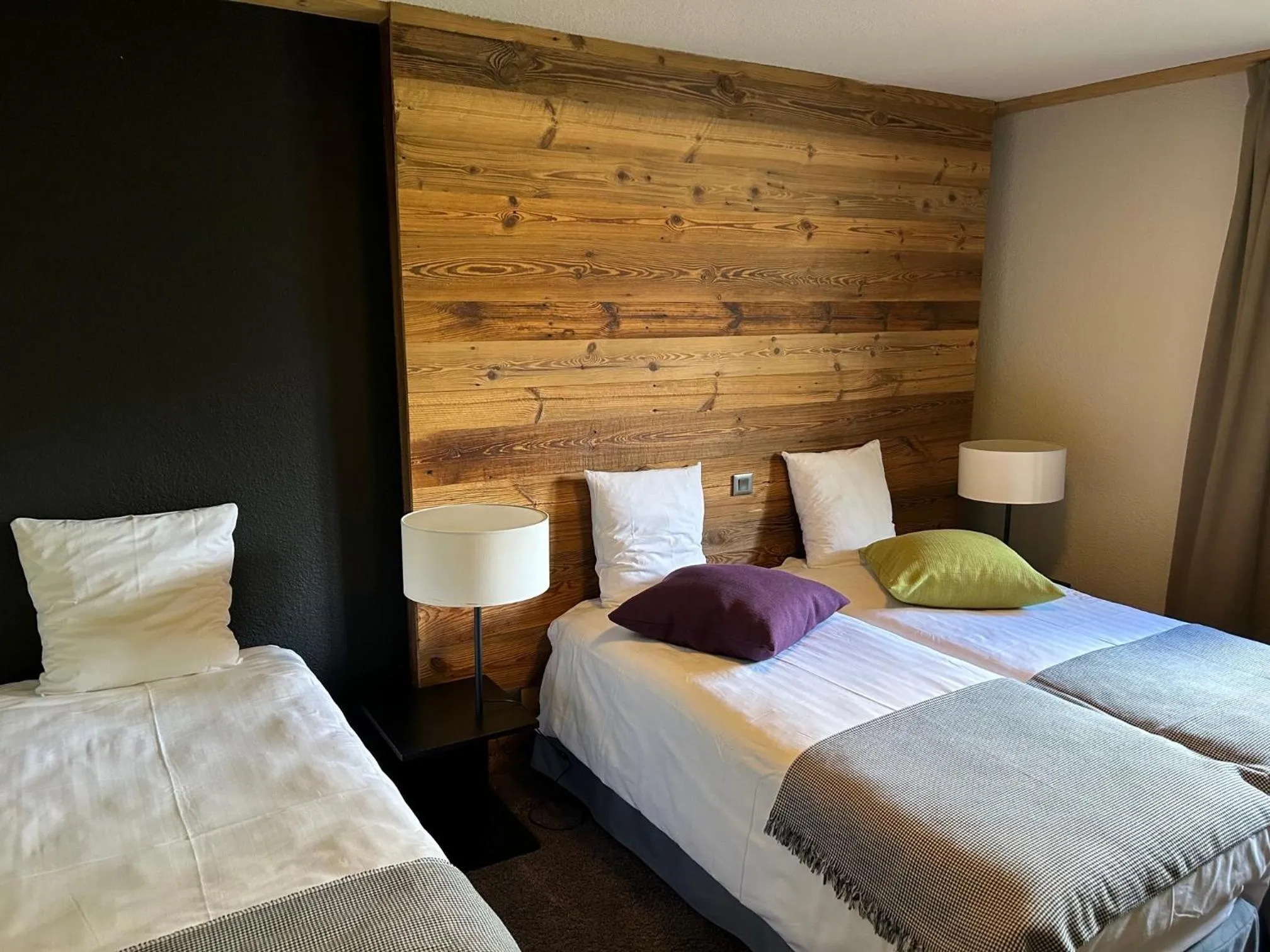 Bed in Hillary Hotel