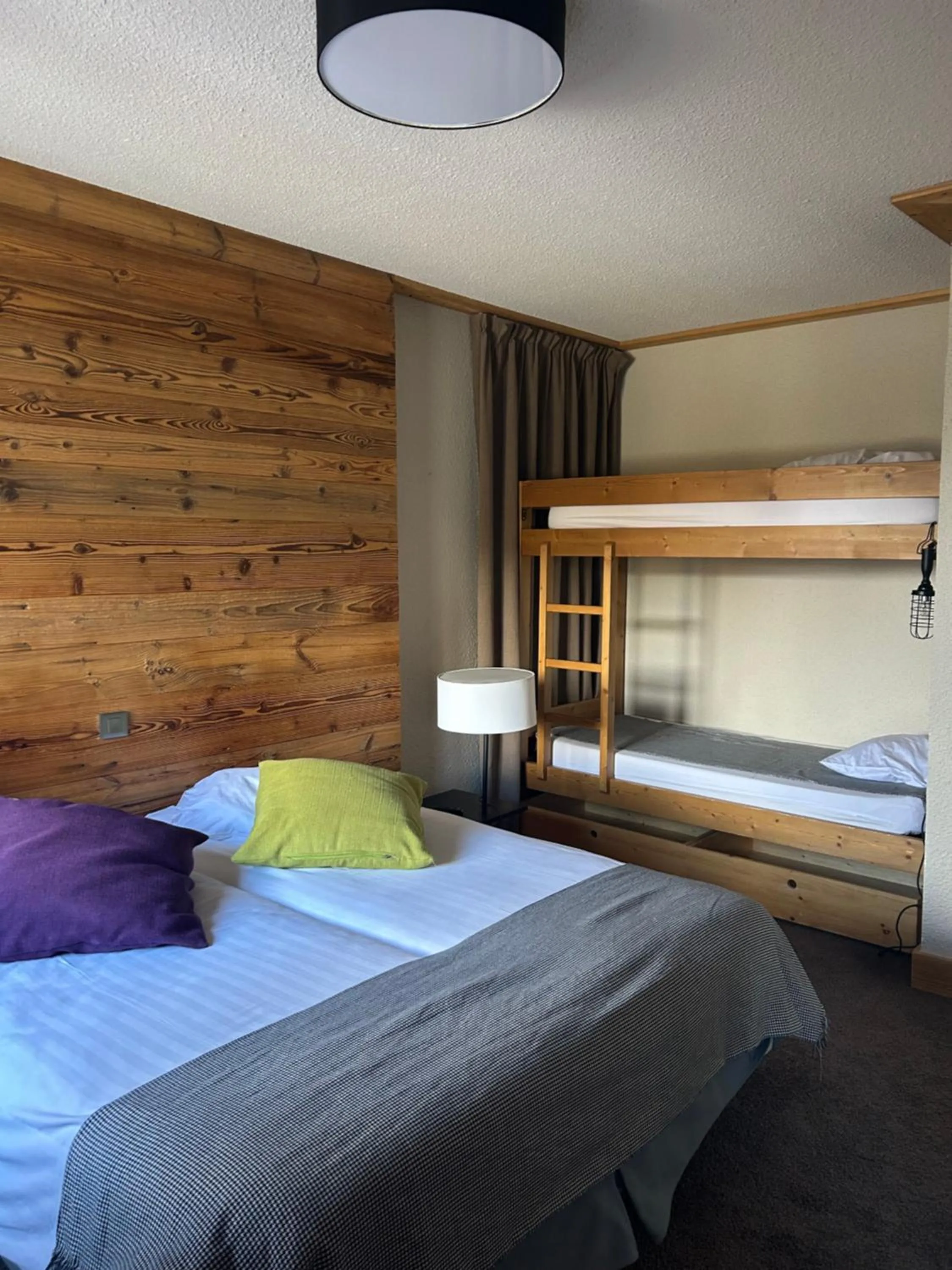 Bed in Hillary Hotel