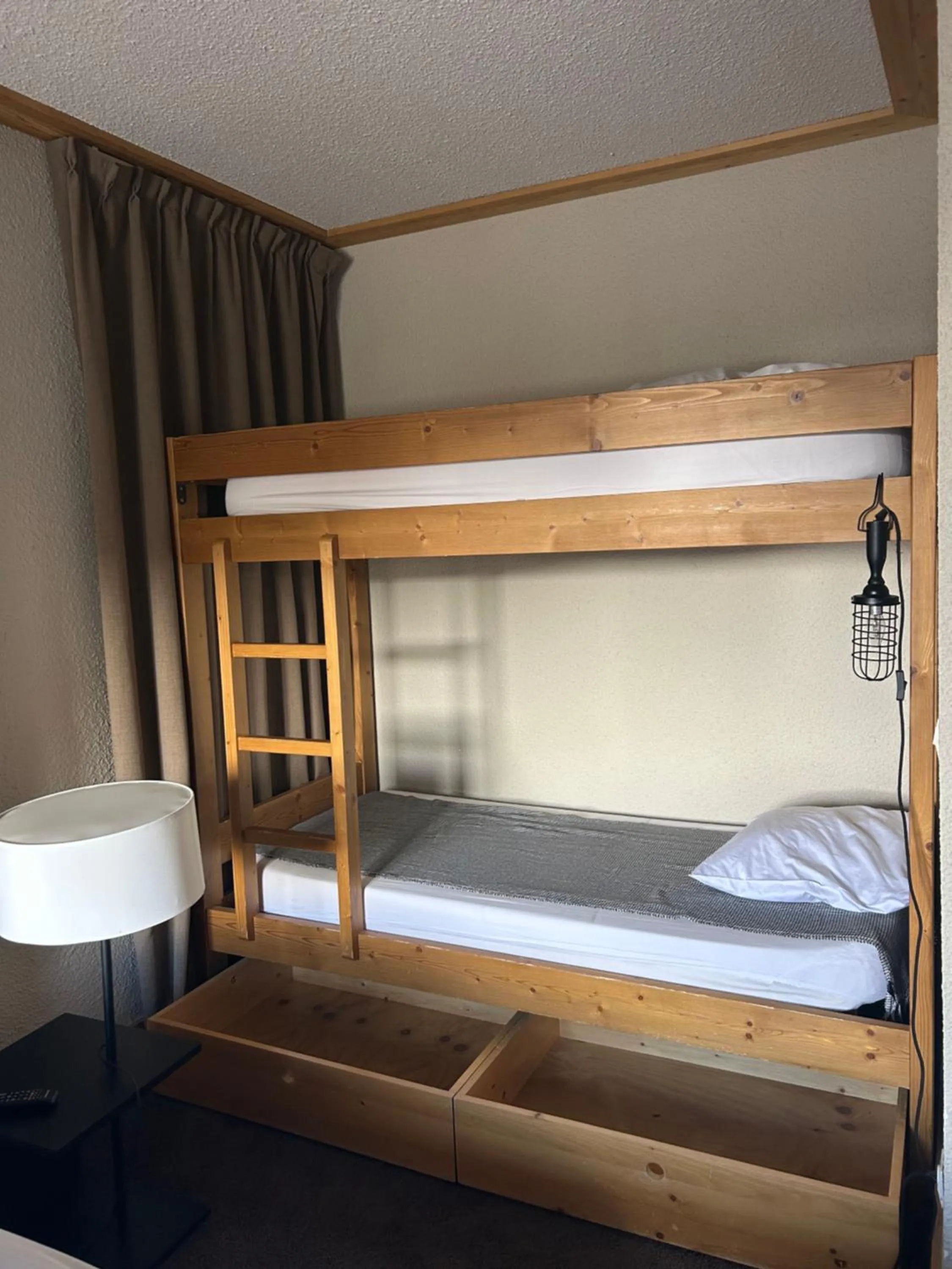 Bed in Hillary Hotel