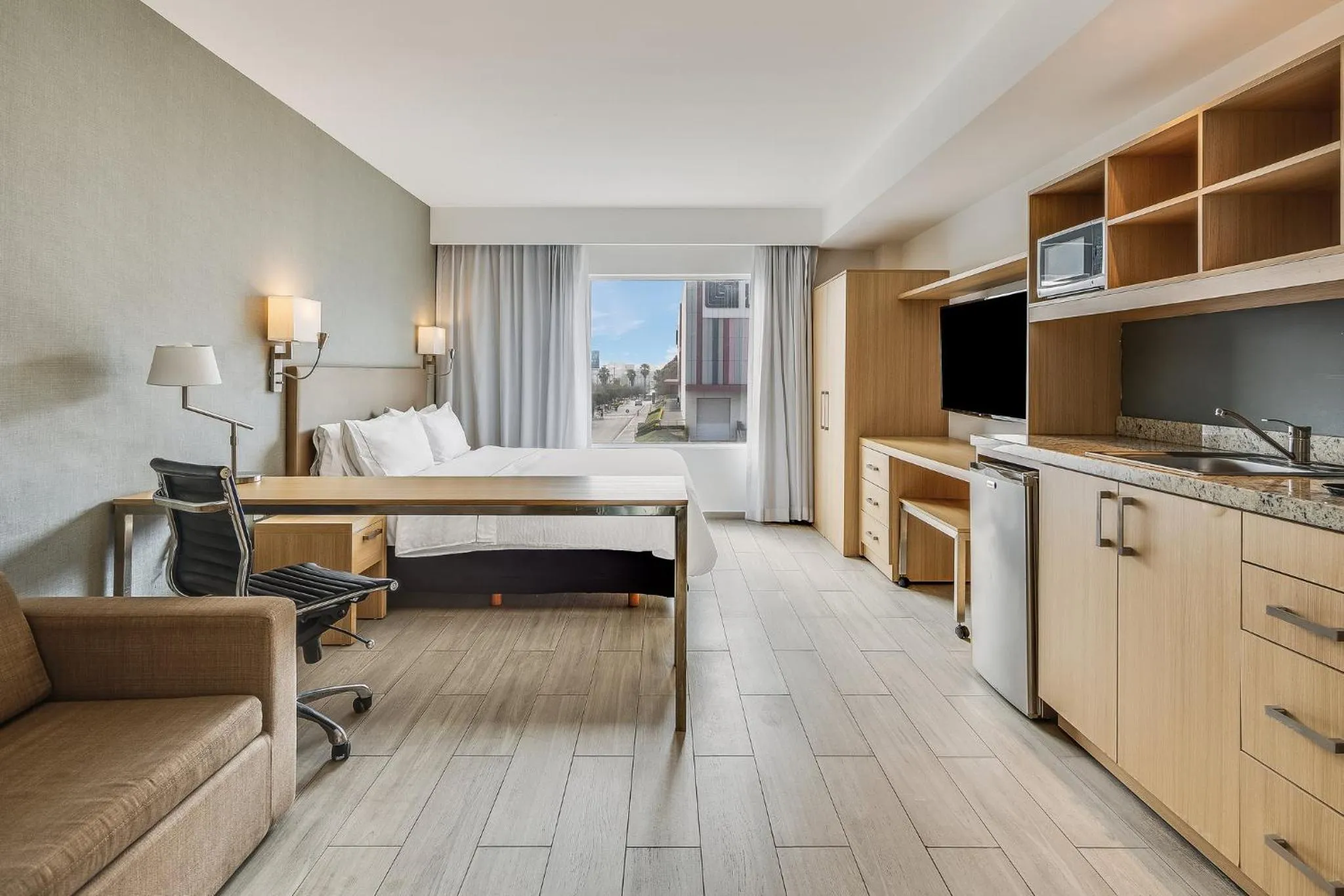 Property building, Bed in Fiesta Inn Monterrey la Fe