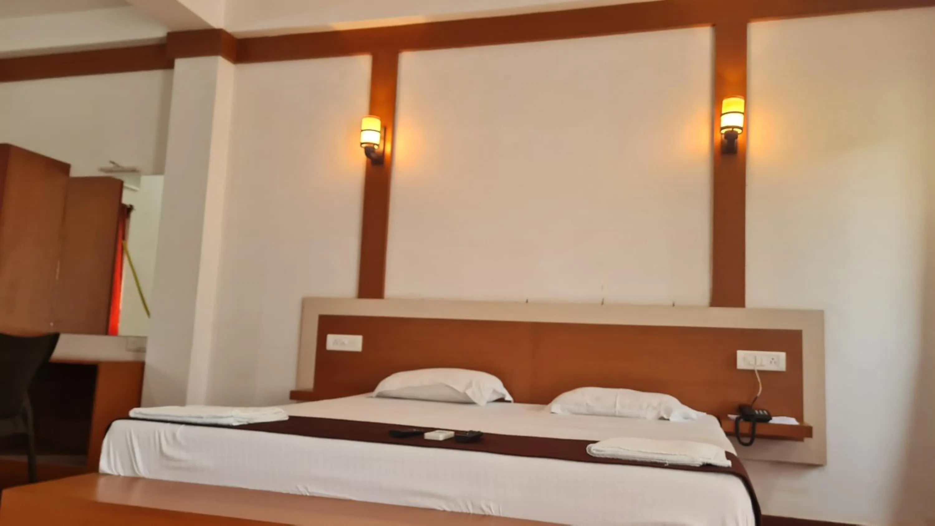 Bed in Hotel Exotica Squares