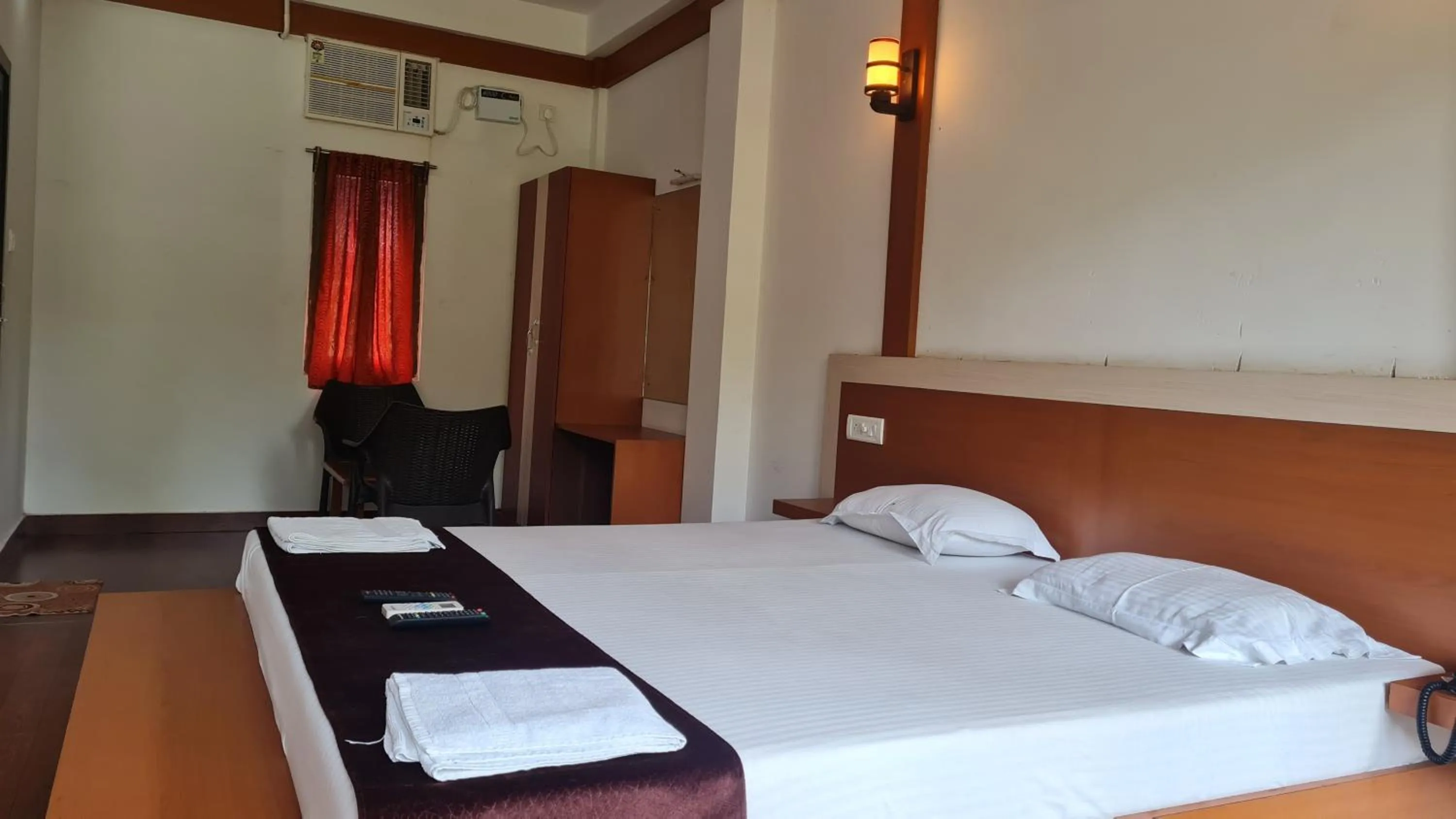 Bed in Hotel Exotica Squares