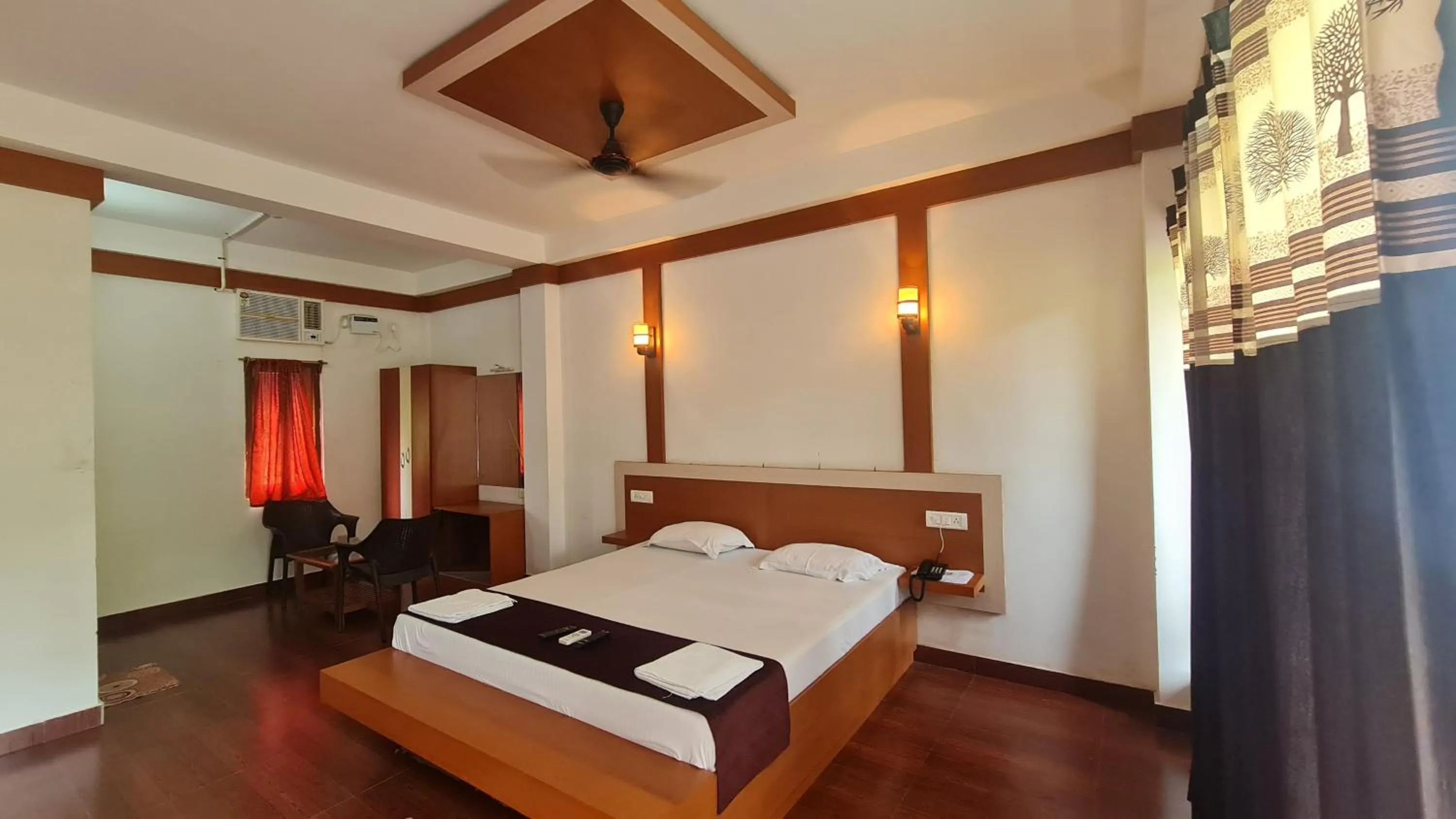 Bed in Hotel Exotica Squares