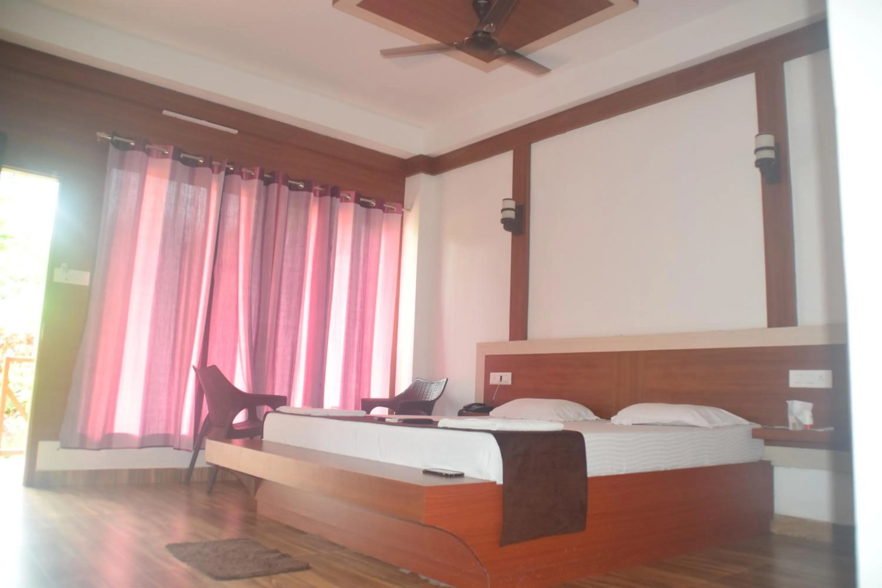 Bed in Hotel Exotica Squares