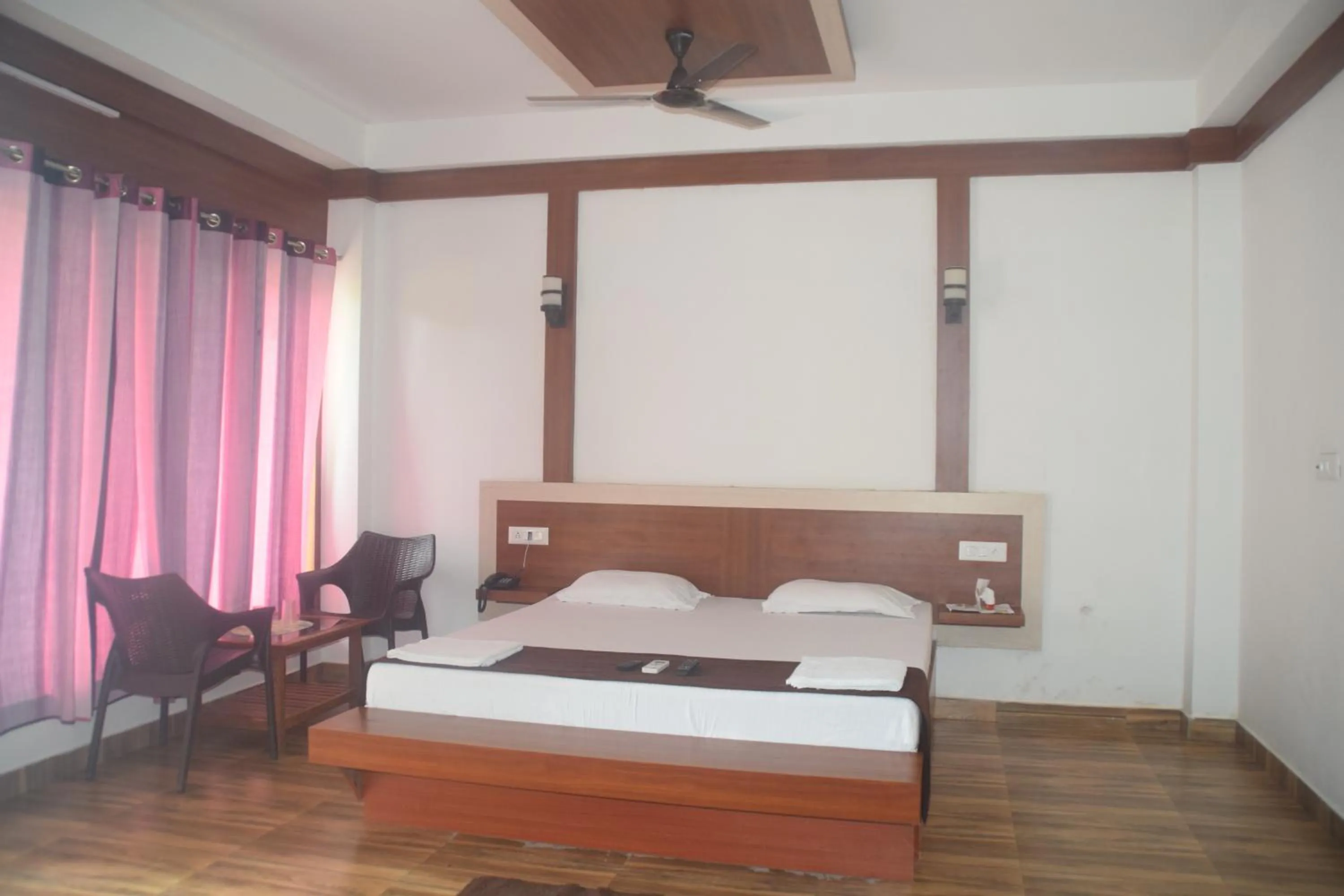 Bed in Hotel Exotica Squares