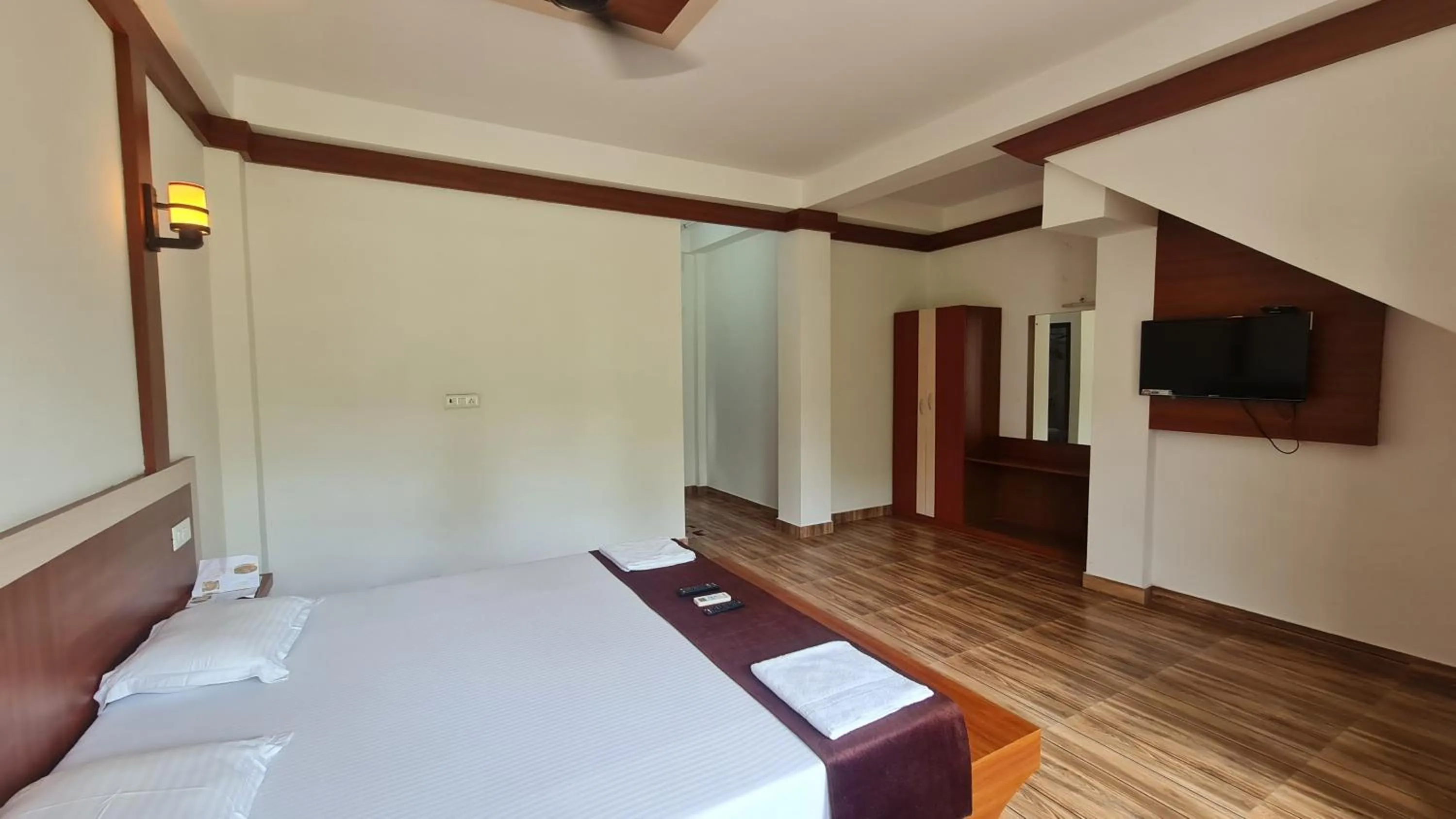 Bed in Hotel Exotica Squares