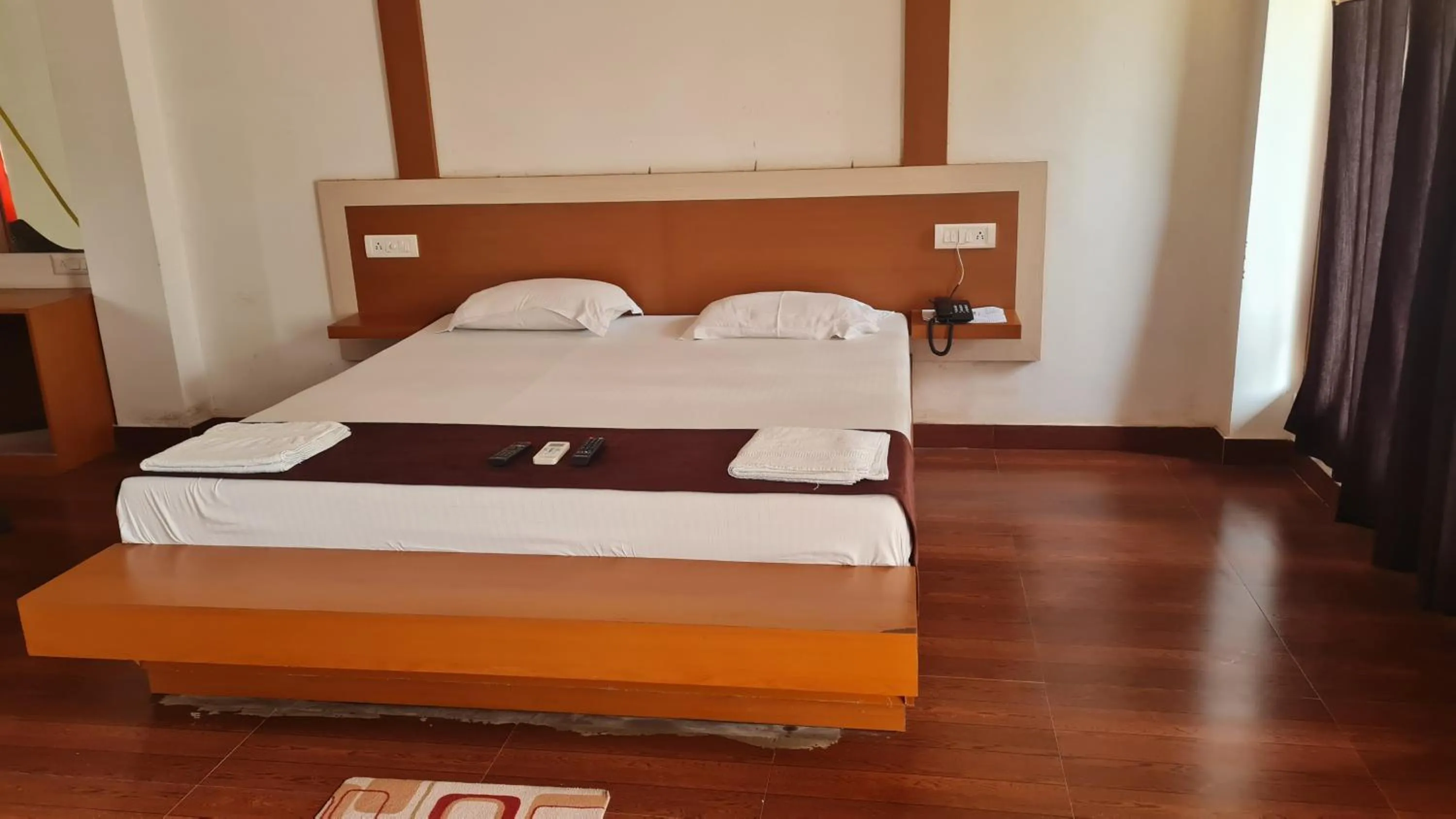 Bed in Hotel Exotica Squares