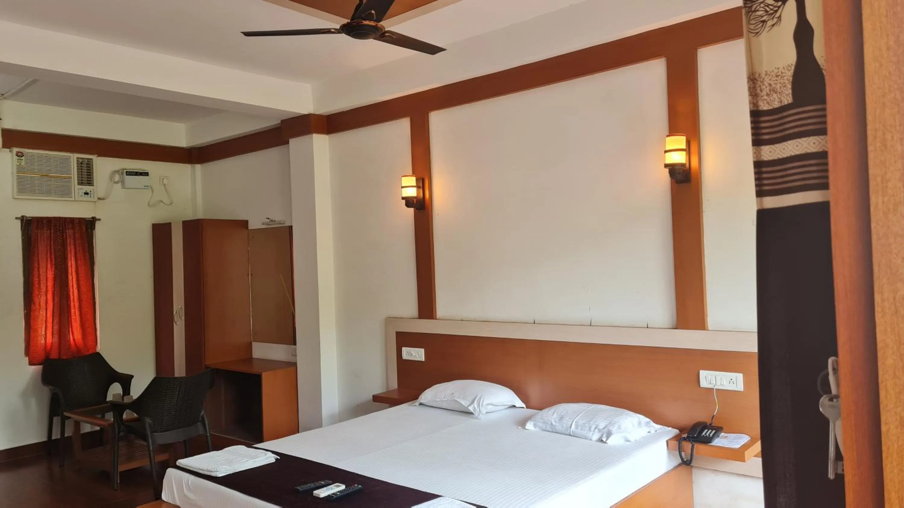 Bed in Hotel Exotica Squares