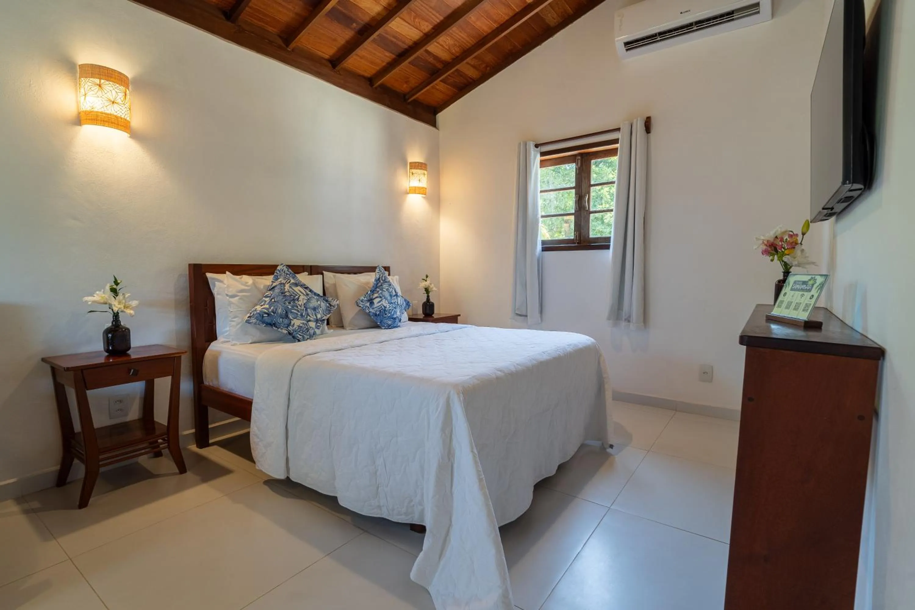 Bed in Pousada Samambaia