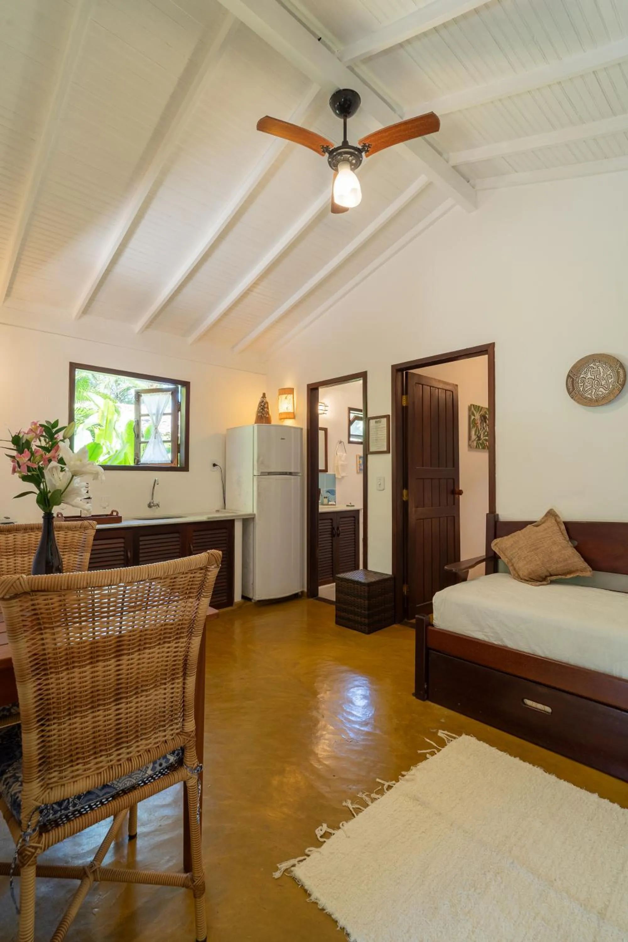 Living room, Bed in Pousada Samambaia