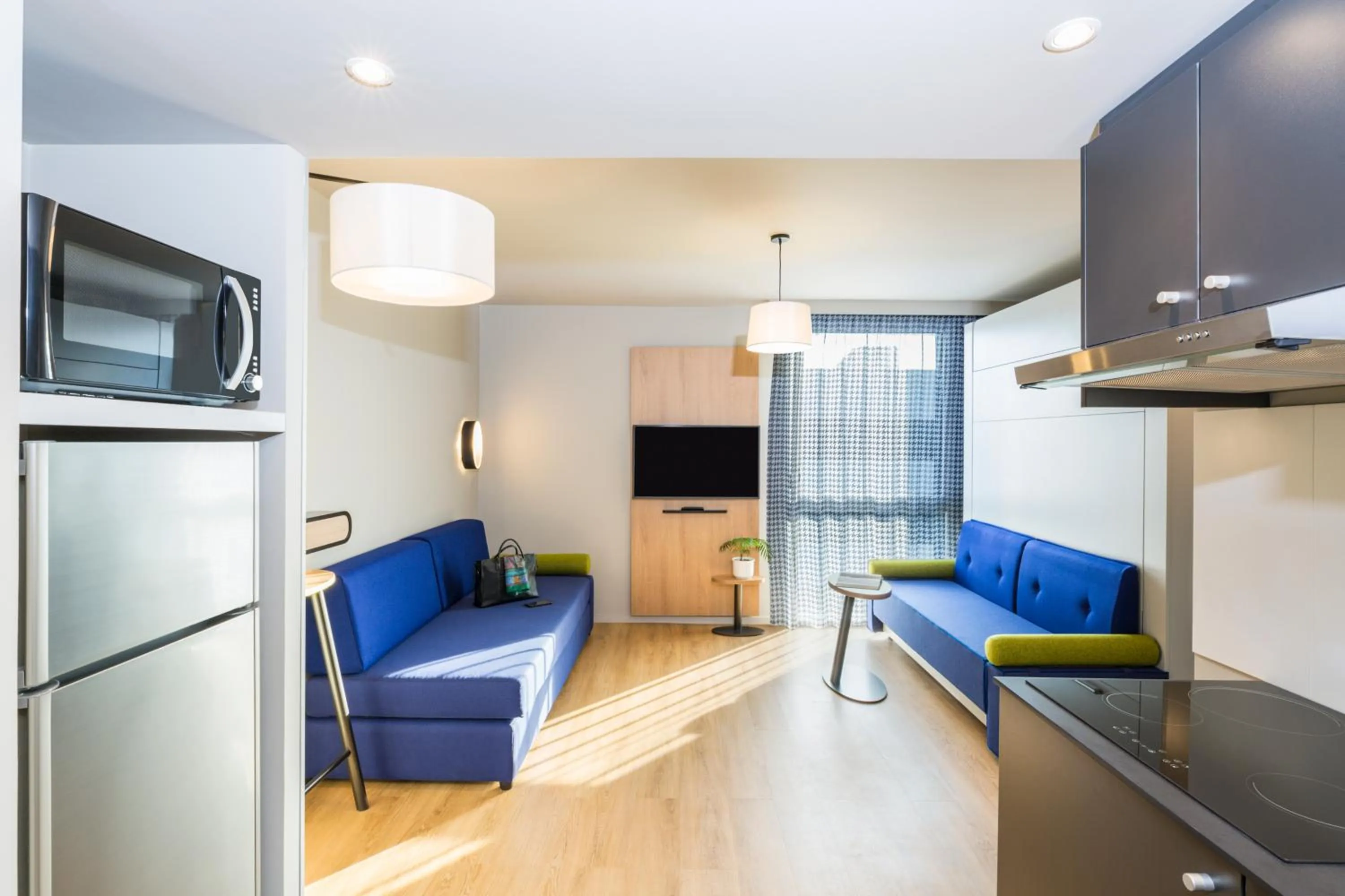 TV and multimedia in Aparthotel Adagio access Palaiseau Saclay