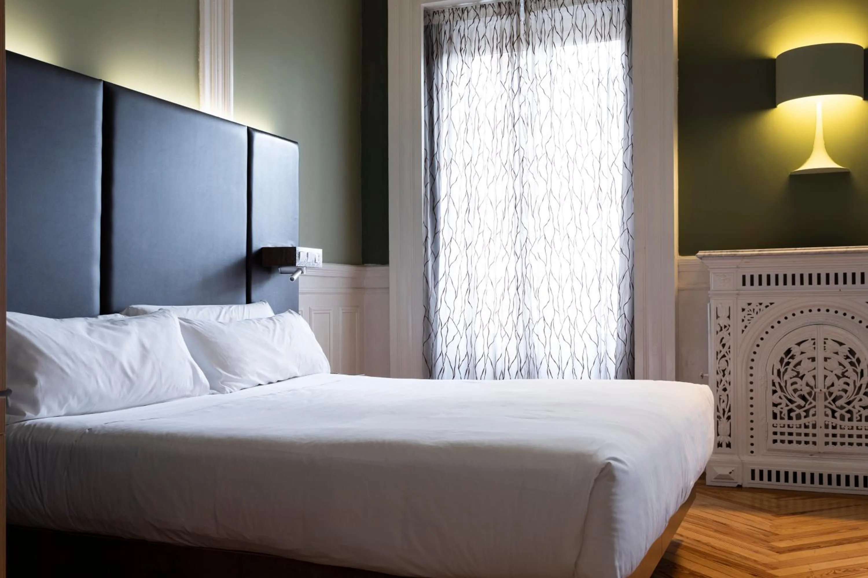 Bed in Petit Palace Lealtad Plaza